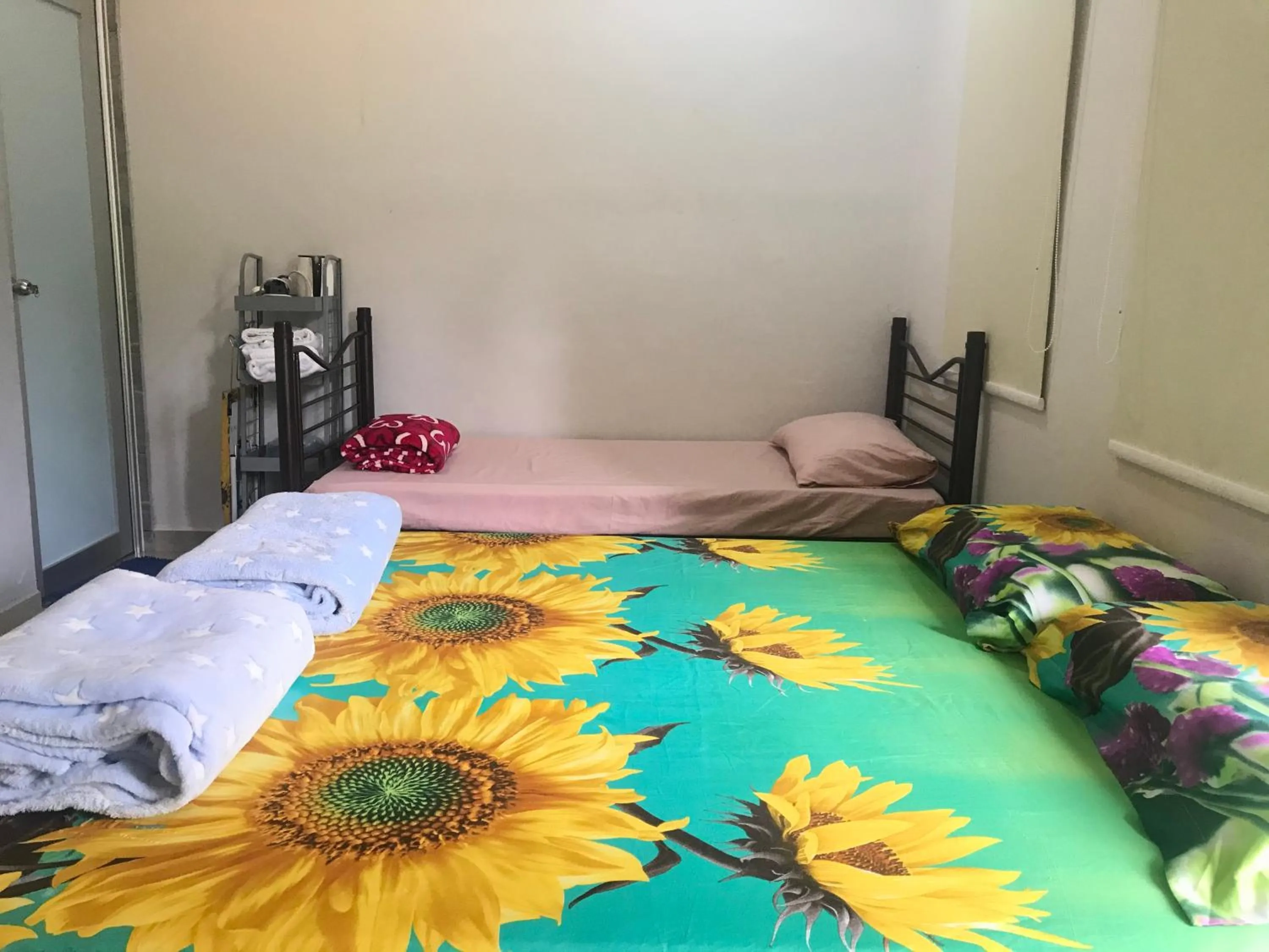 Bed in Jiaxin Homestay - JP Pedana 家馨民宿