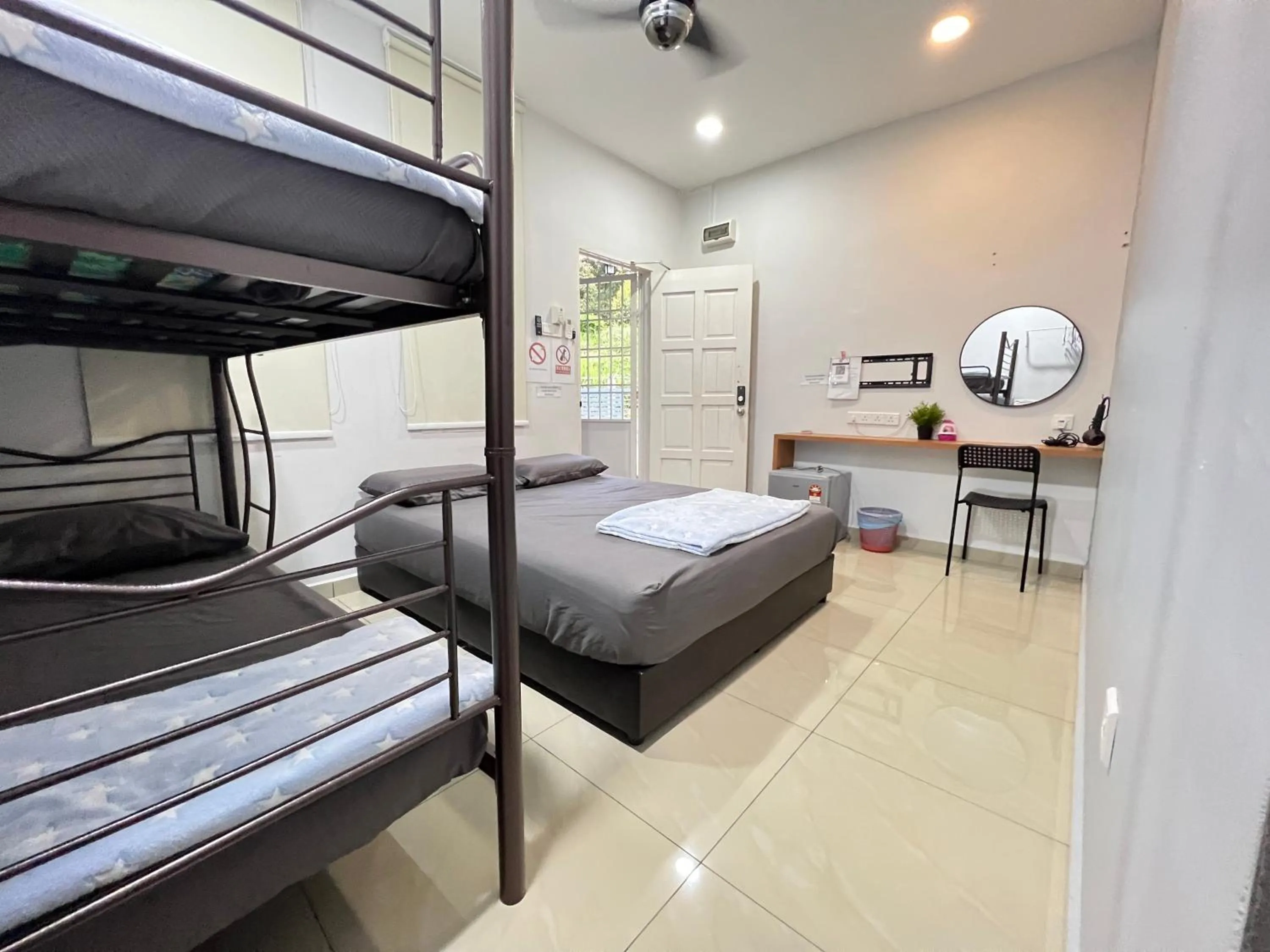 Bed in Jiaxin Homestay - JP Pedana 家馨民宿