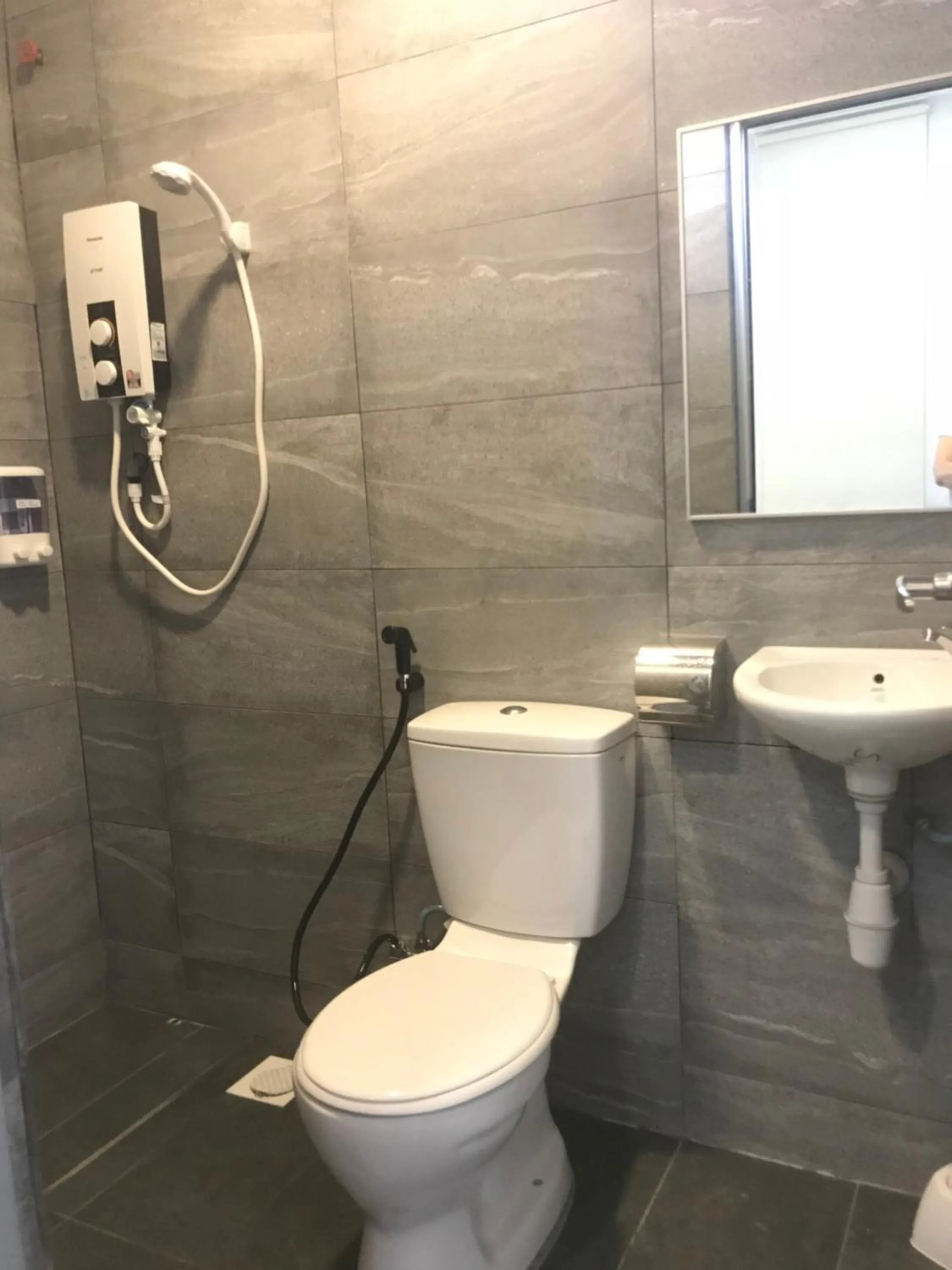 Bathroom in Jiaxin Homestay - JP Pedana 家馨民宿