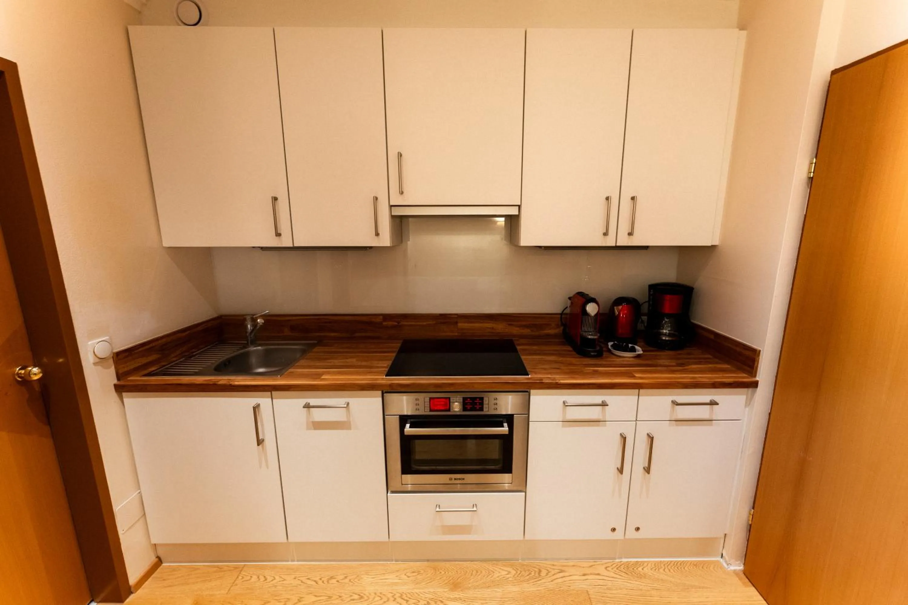 Kitchen or kitchenette in Aparthotel Pfeffermühle