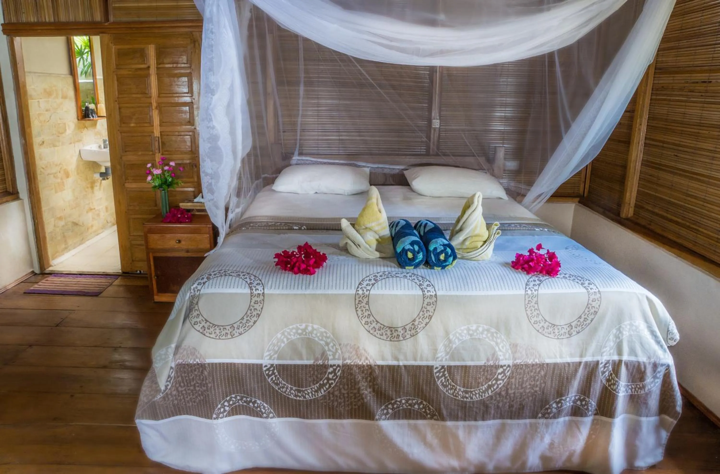 Bed in Bunaken Divers Sea Breeze Resort