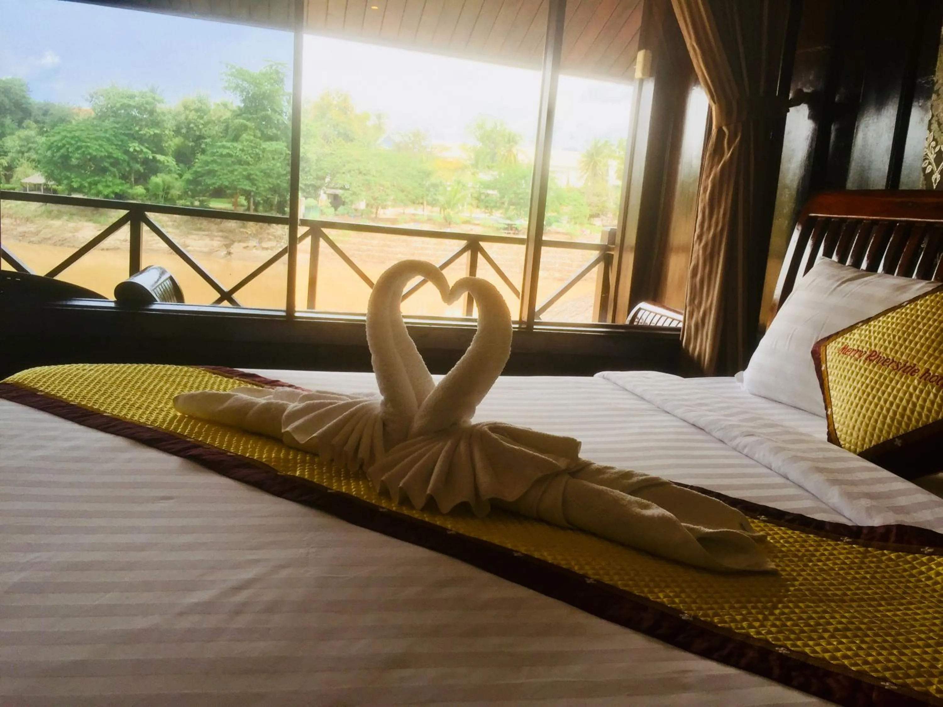 Decorative detail, Bed in Merry Riverside Hotel