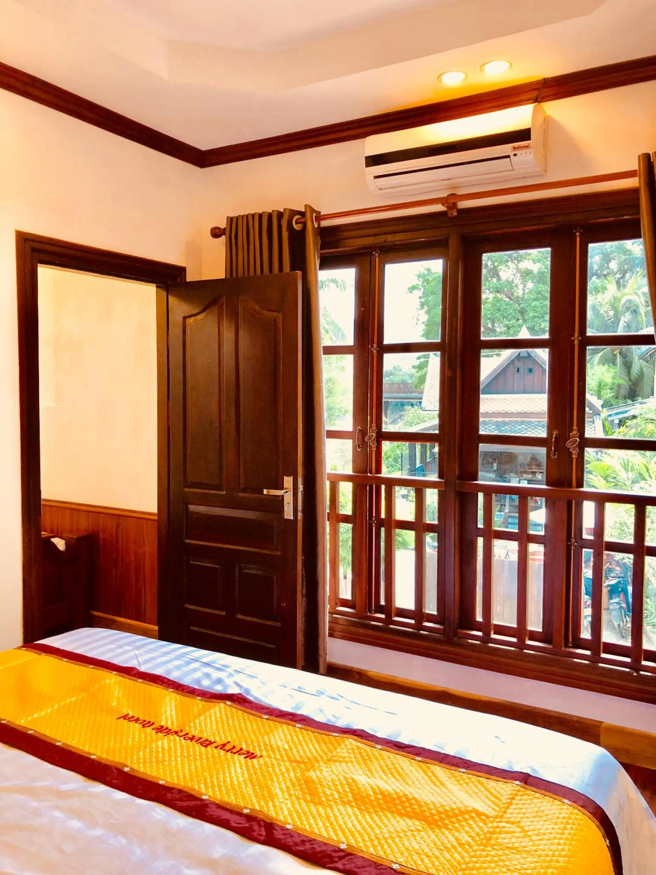 Photo of the whole room, Bed in Merry Riverside Hotel