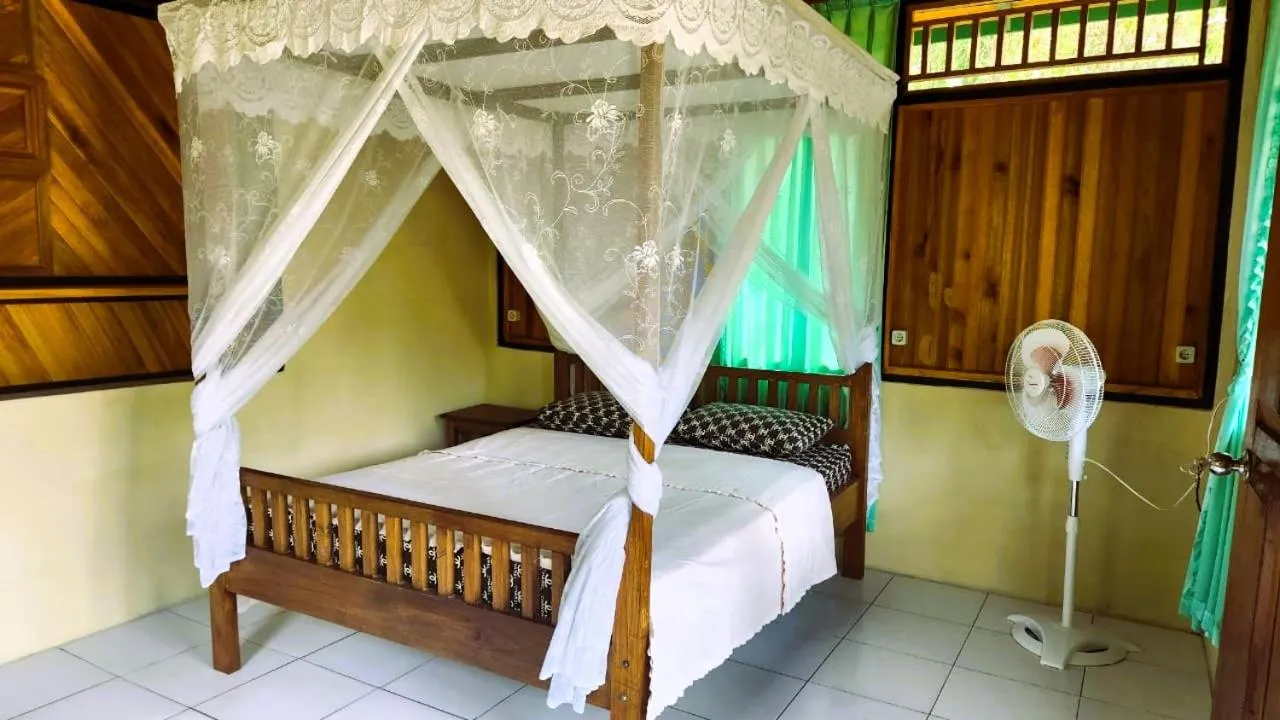 Bed in Bunaken Sea Garden Resort