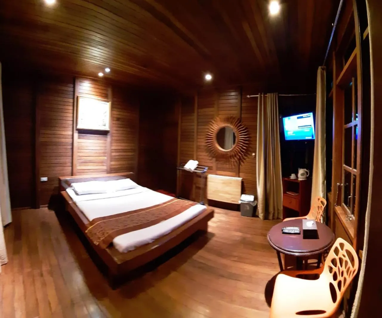 Communal lounge/ TV room, Bed in Highland Resort & Nature Tours