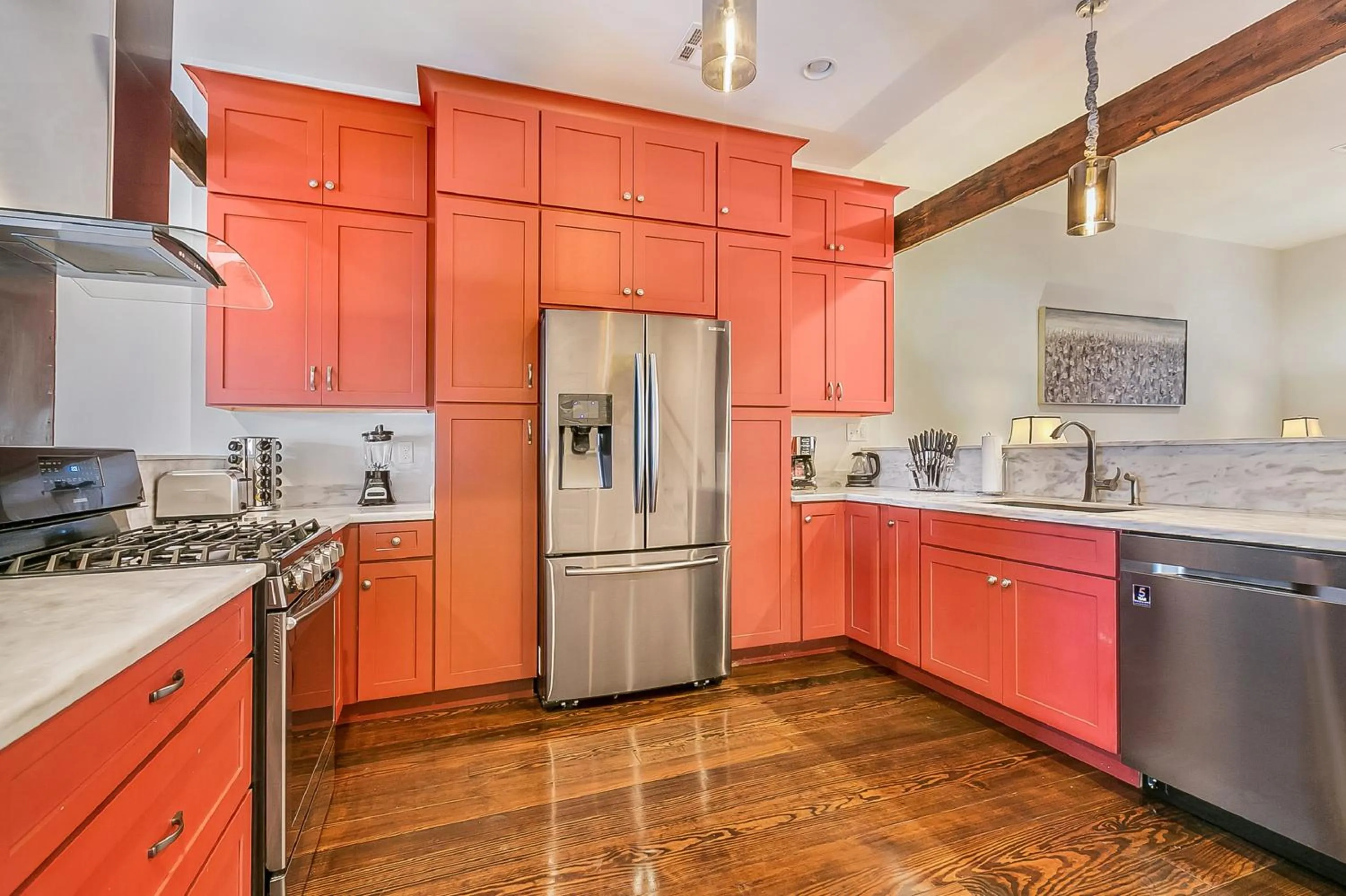 Kitchen or kitchenette in Spacious Loft-Style 3BR Townhouse by Hosteeva