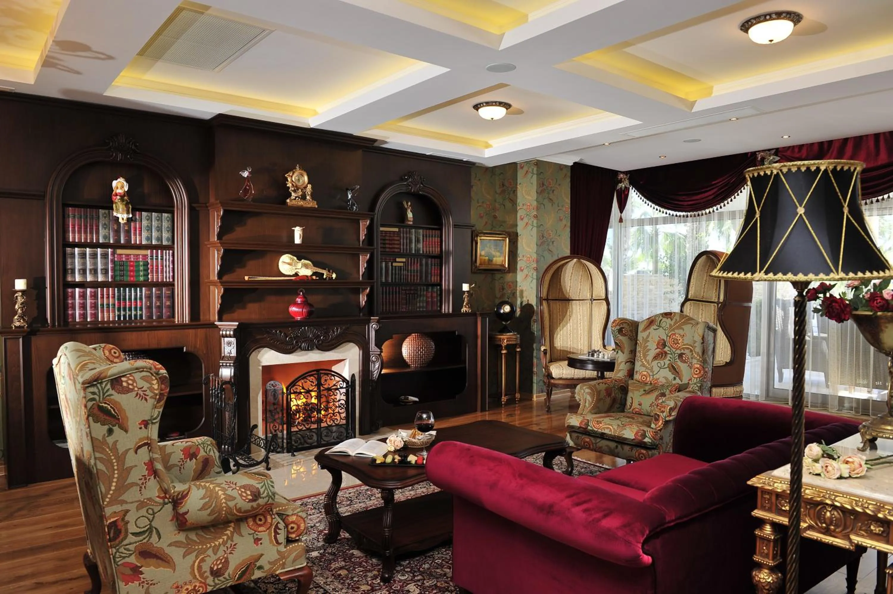 Communal lounge/ TV room in Villa Augusto Boutique Hotel & SPA