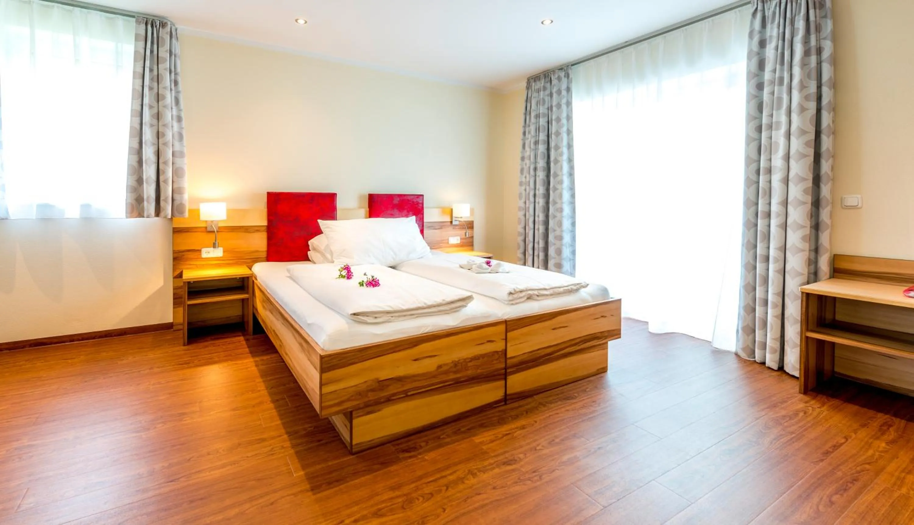 Photo of the whole room, Bed in Panorama Hotel Traunstein