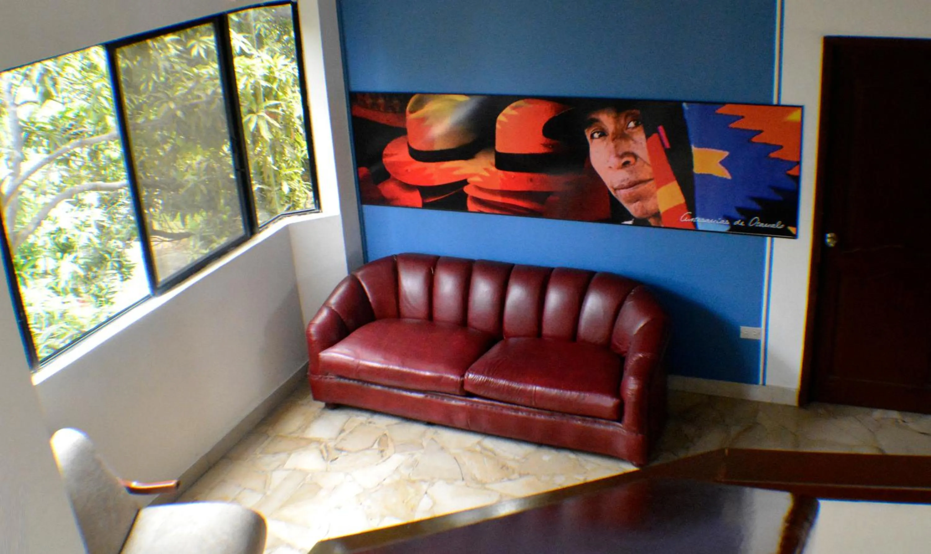 Communal lounge/ TV room in Hotel de Alborada