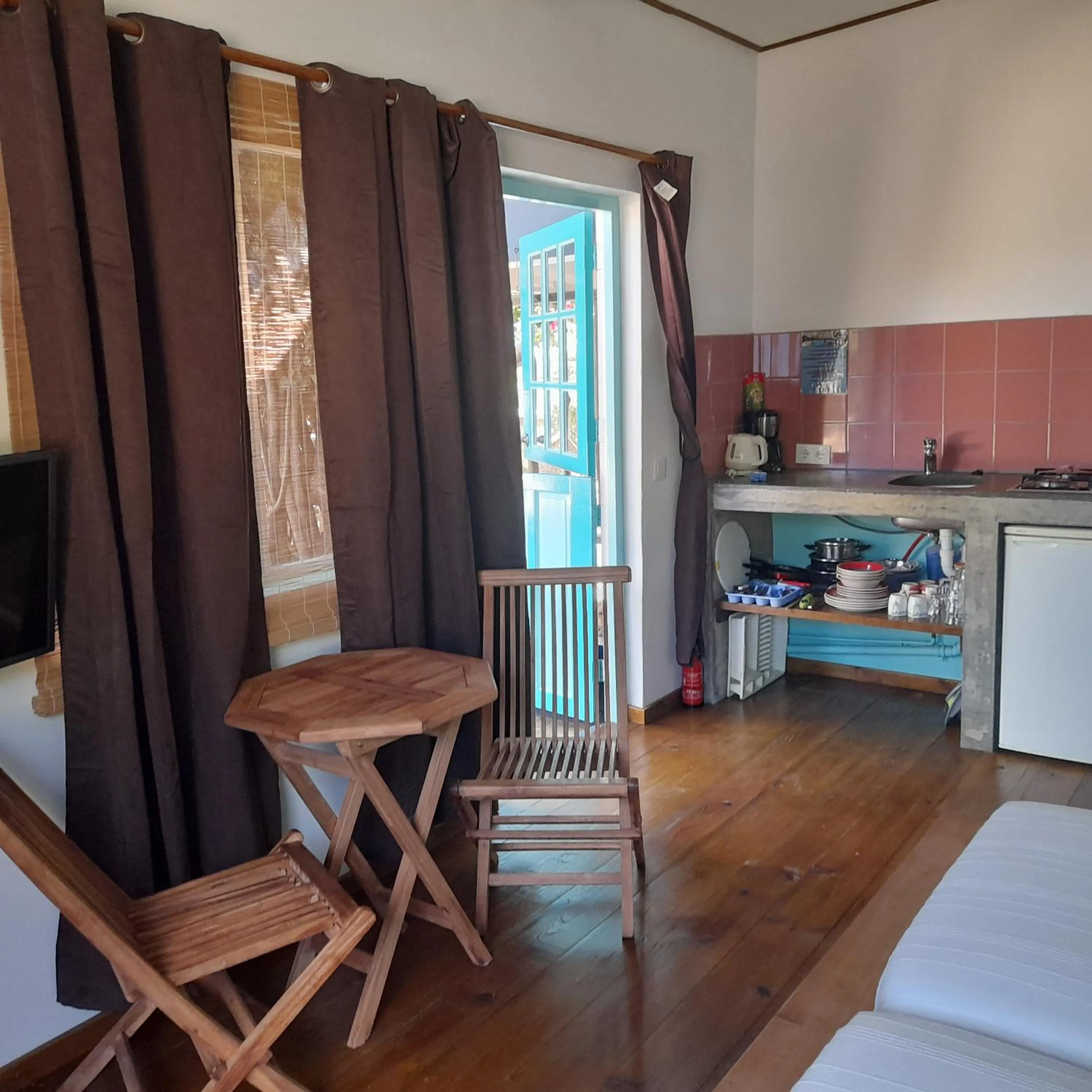 Seating area, Bed in Caribbean Chillout Apartments