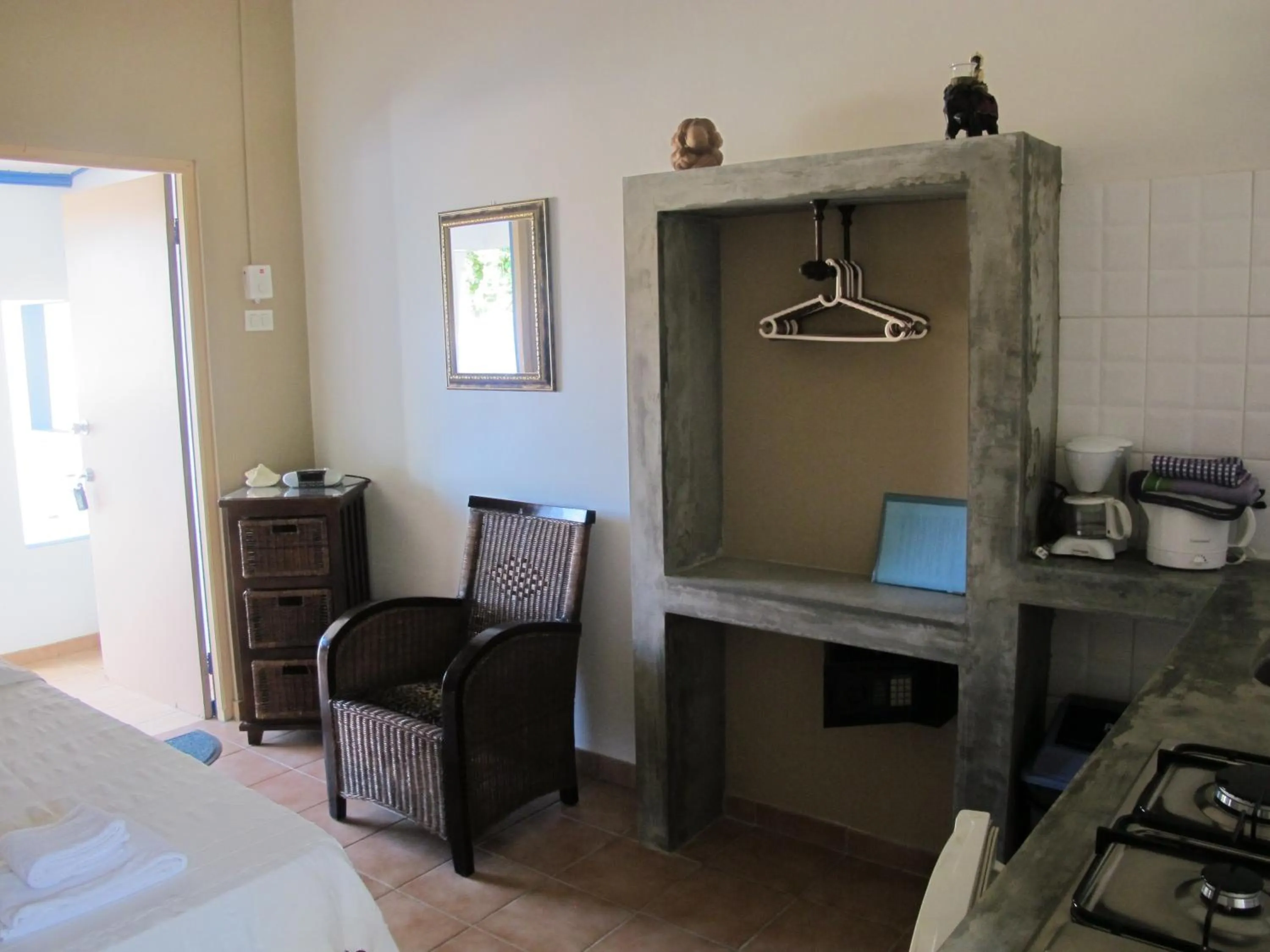 Seating area, Bed in Caribbean Chillout Apartments