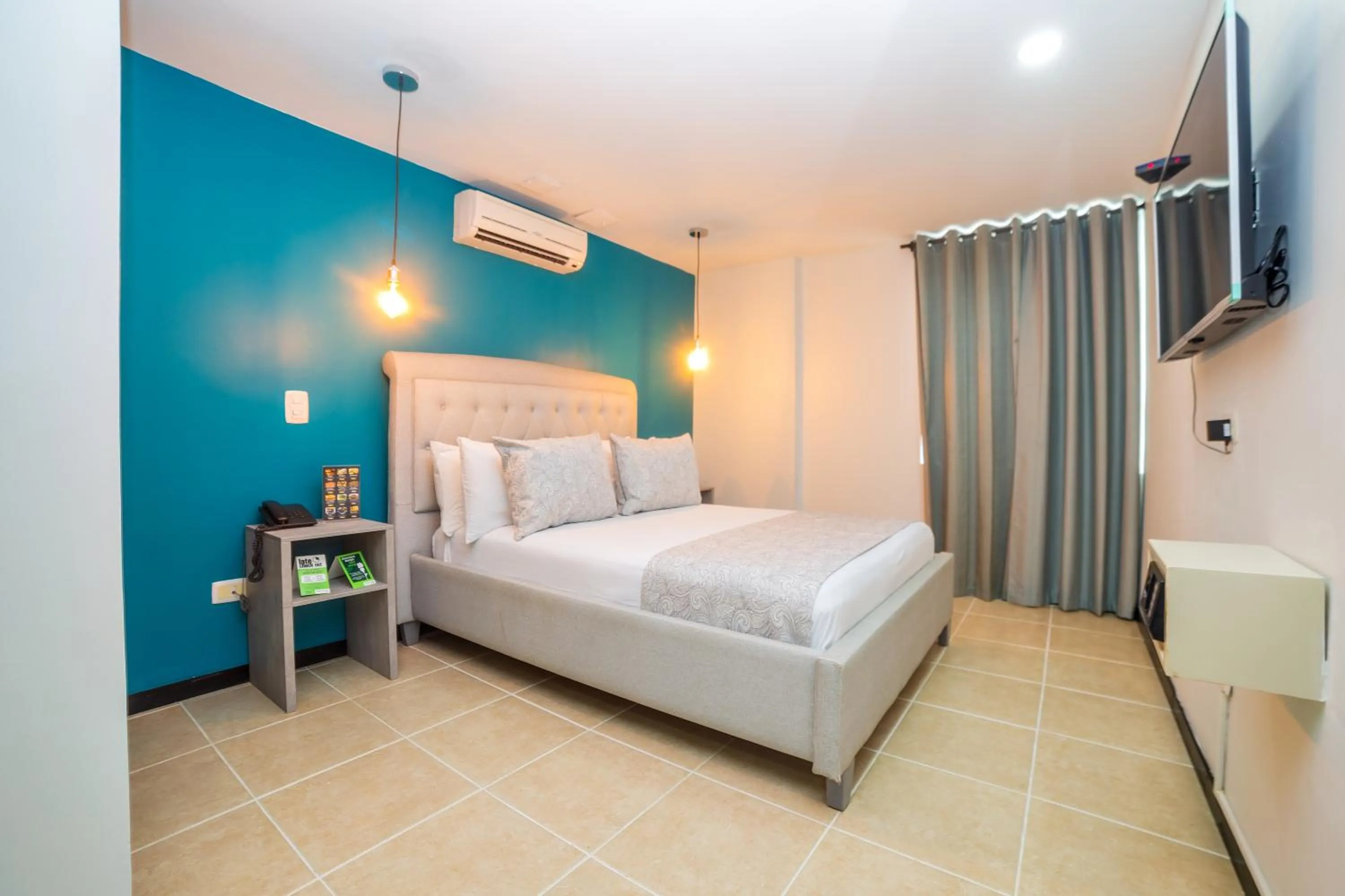 Bedroom, Bed in Greenview Medellin By St Hoteles