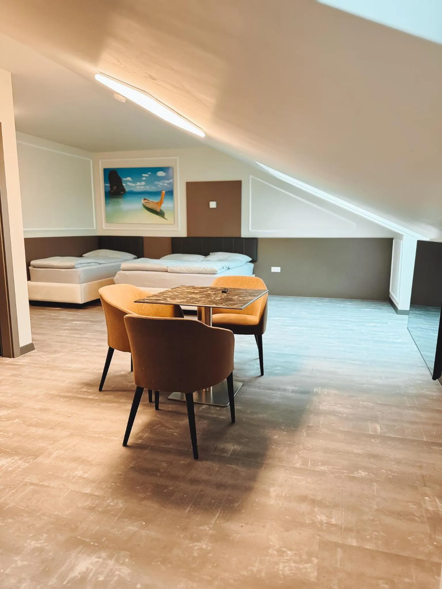 Seating area in F Hotel 24h Check-In