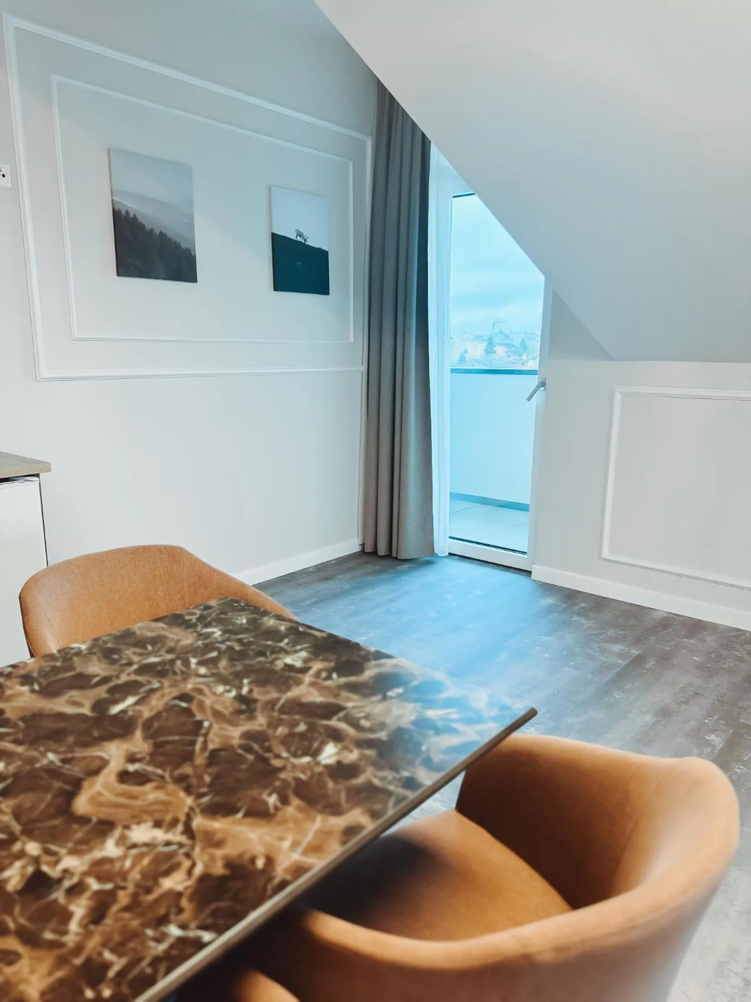 Seating area in F Hotel 24h Check-In