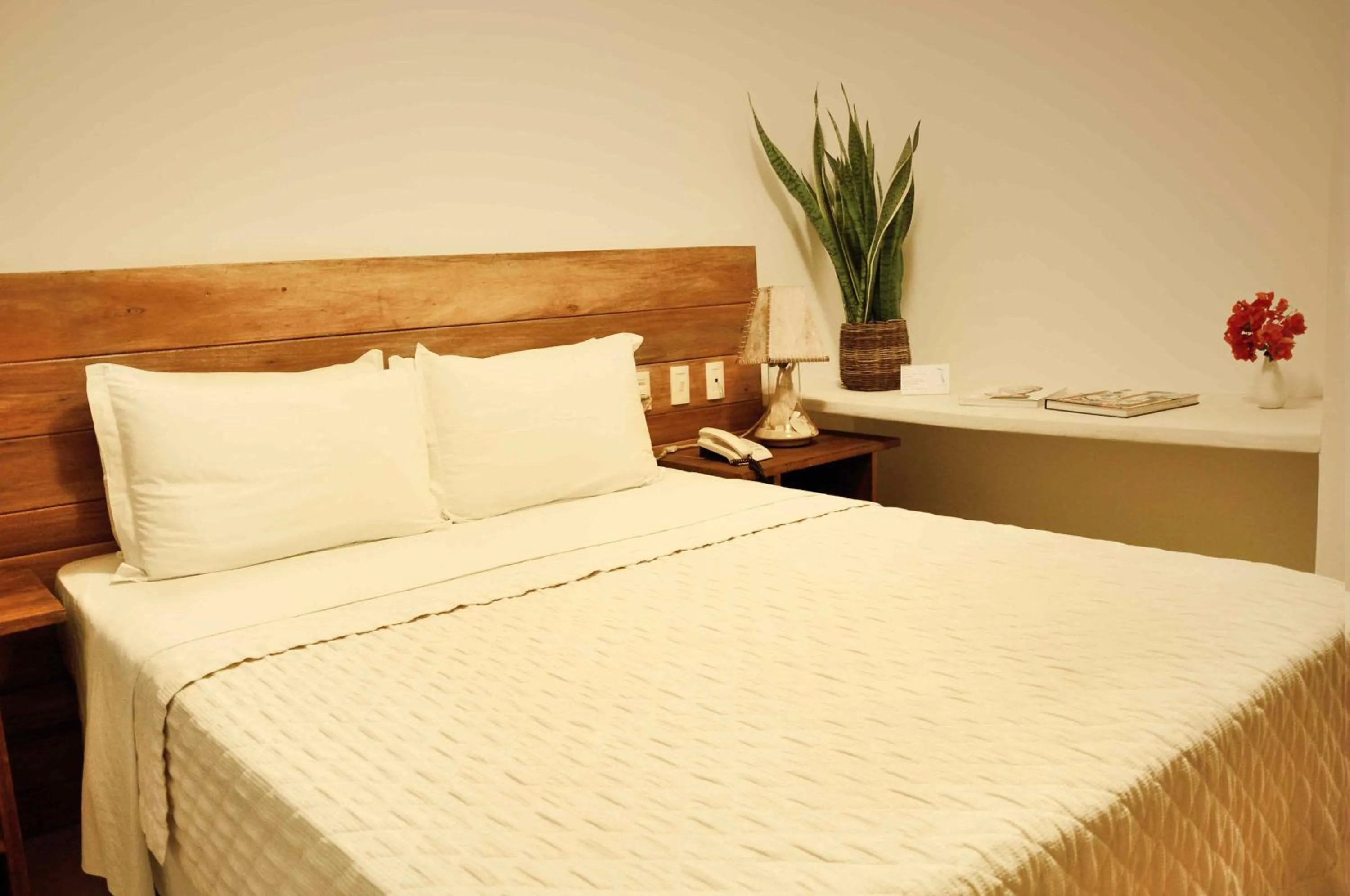 Bed in Pousada dos Ponteiros