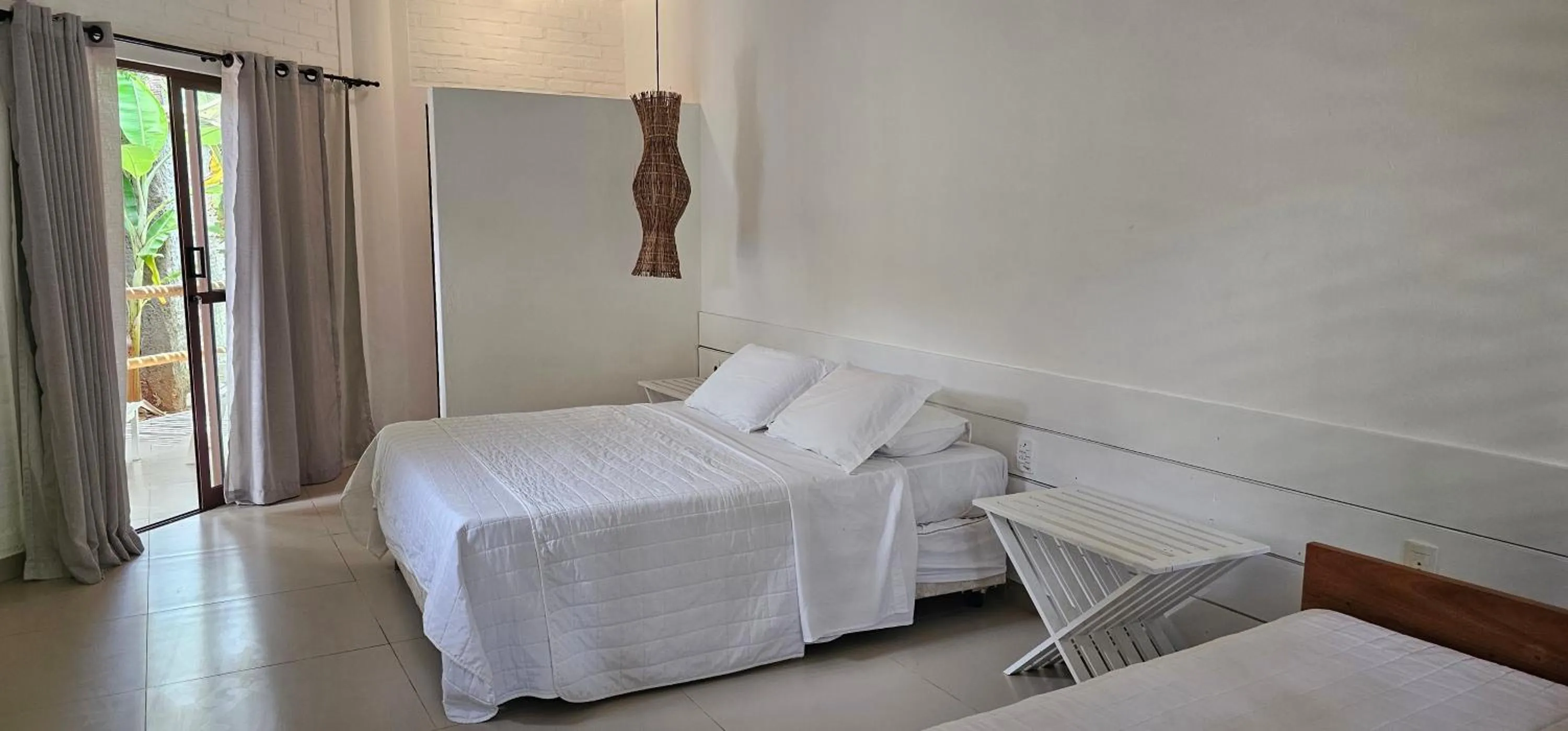 Bed in Pousada dos Ponteiros