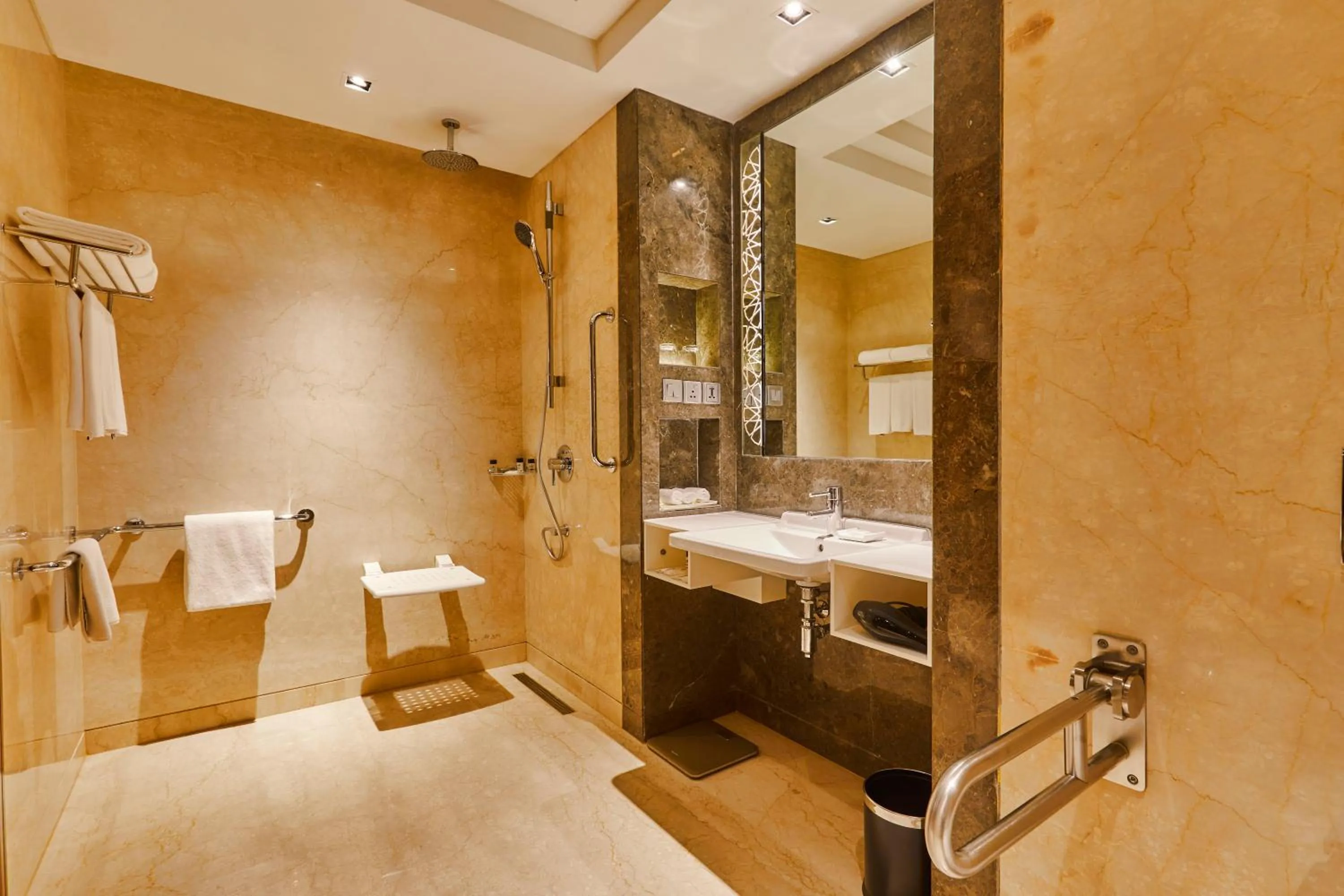 Bathroom, Bed in Crowne Plaza New Delhi Rohini by IHG