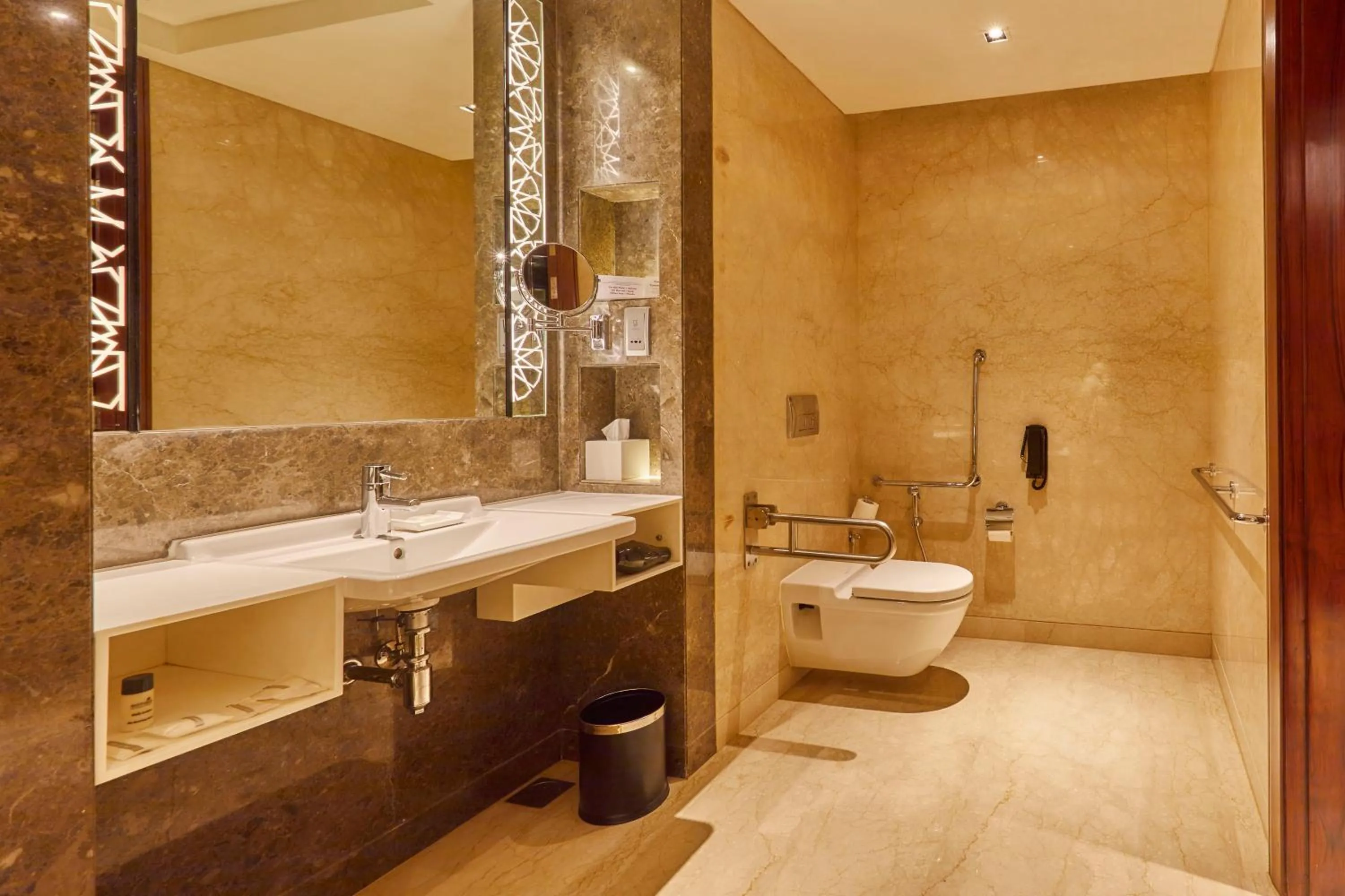 Bathroom in Crowne Plaza New Delhi Rohini by IHG