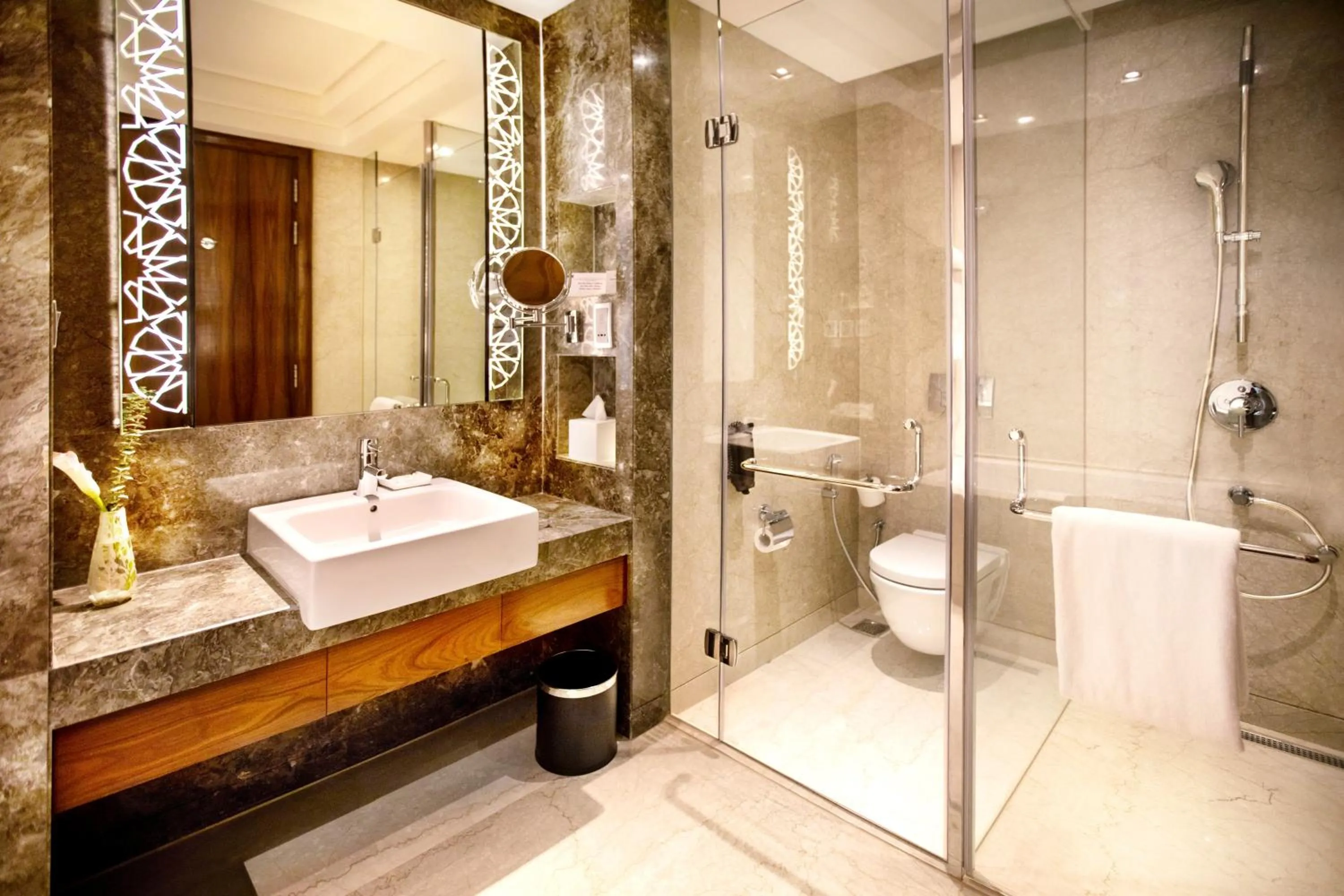 Bathroom in Crowne Plaza New Delhi Rohini by IHG