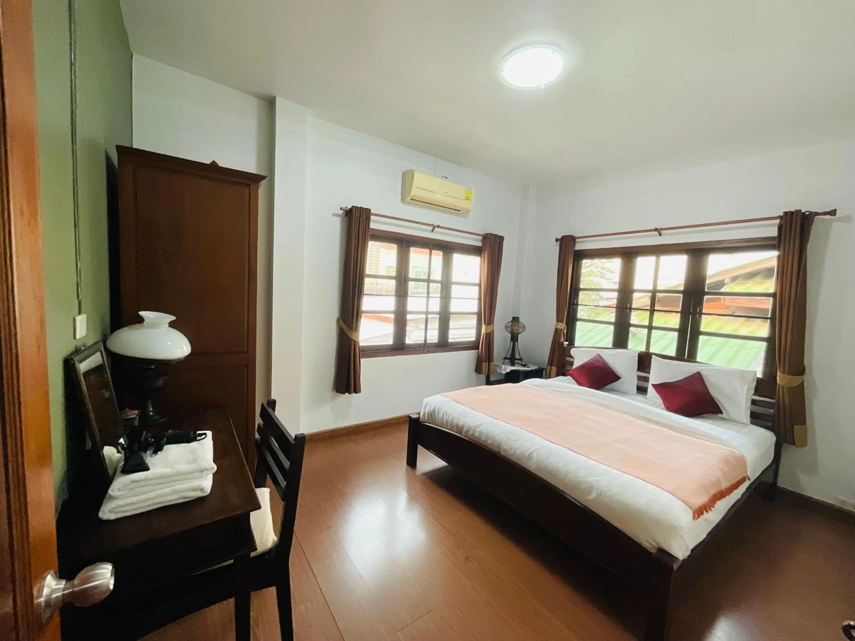 Bed in Baan Klang Vieng