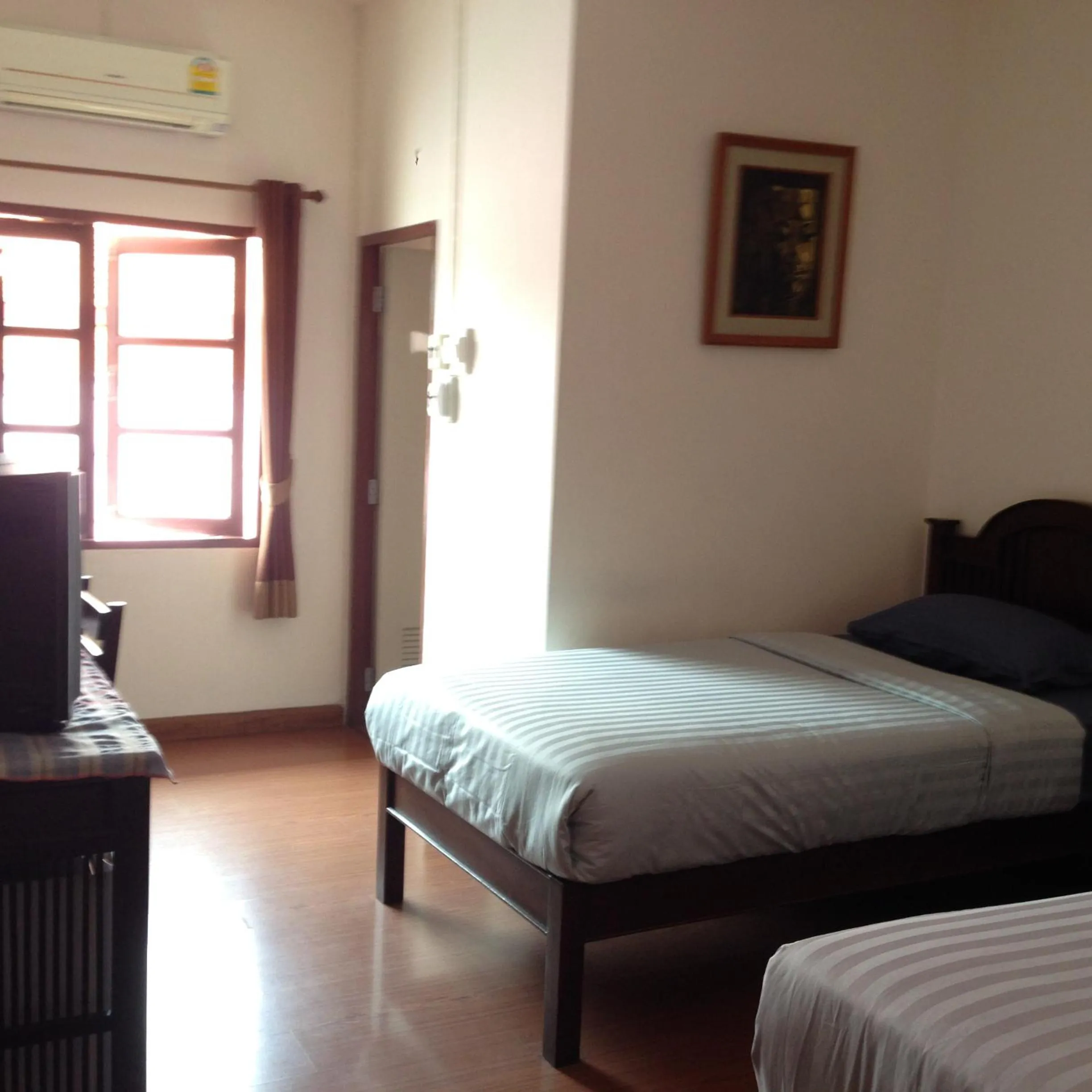 Bed in Baan Klang Vieng