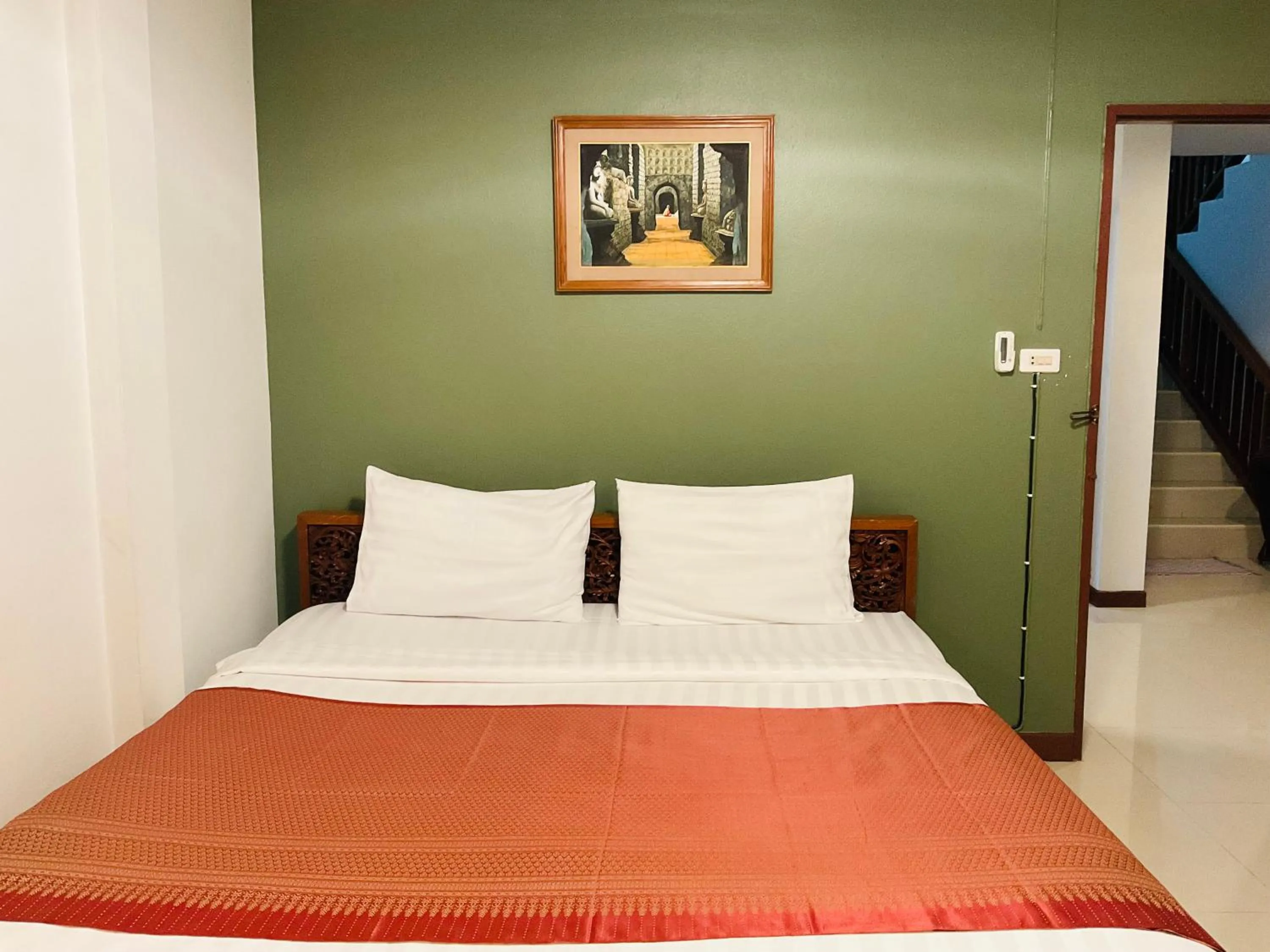 Bed in Baan Klang Vieng