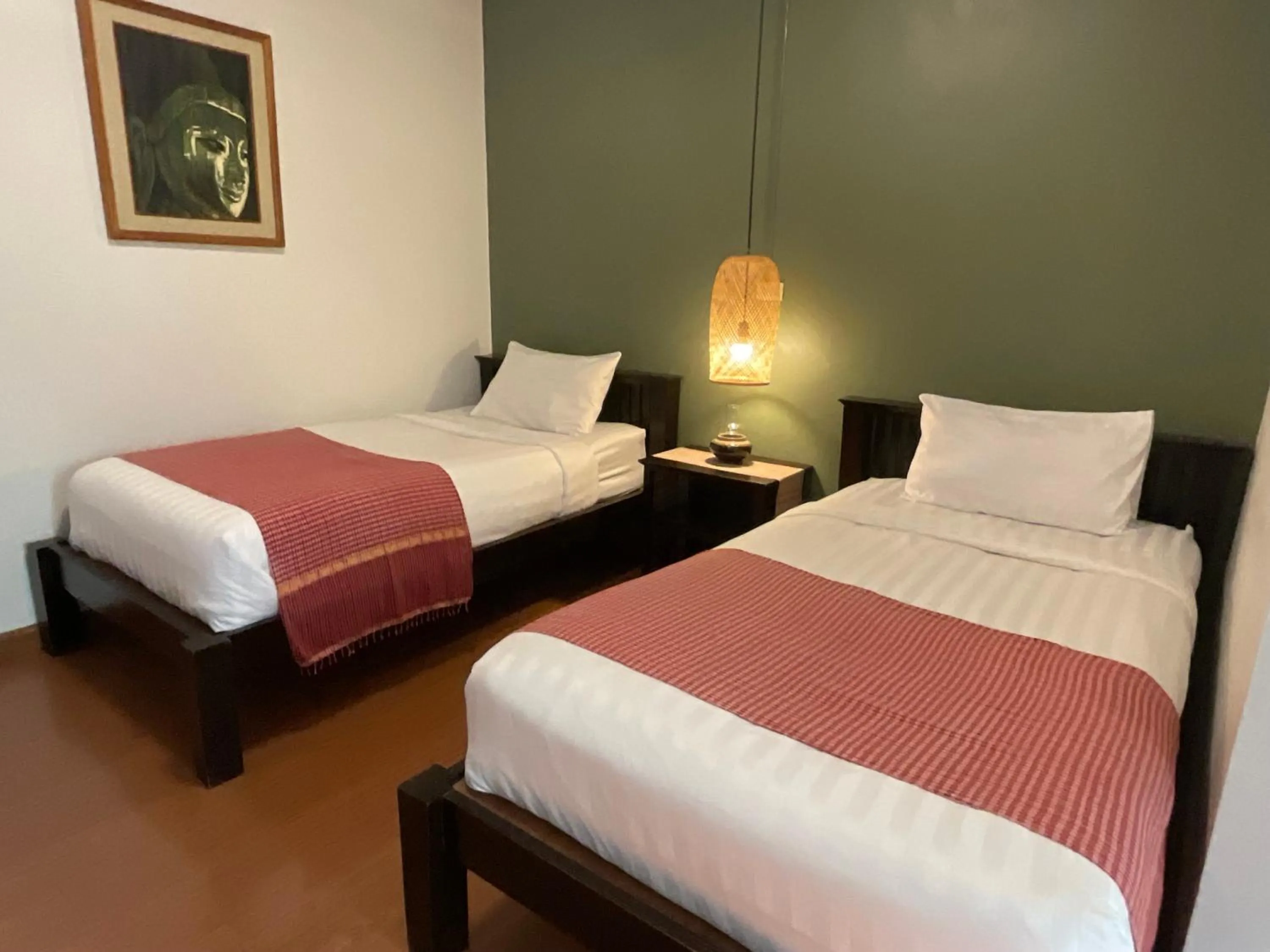 Bed in Baan Klang Vieng