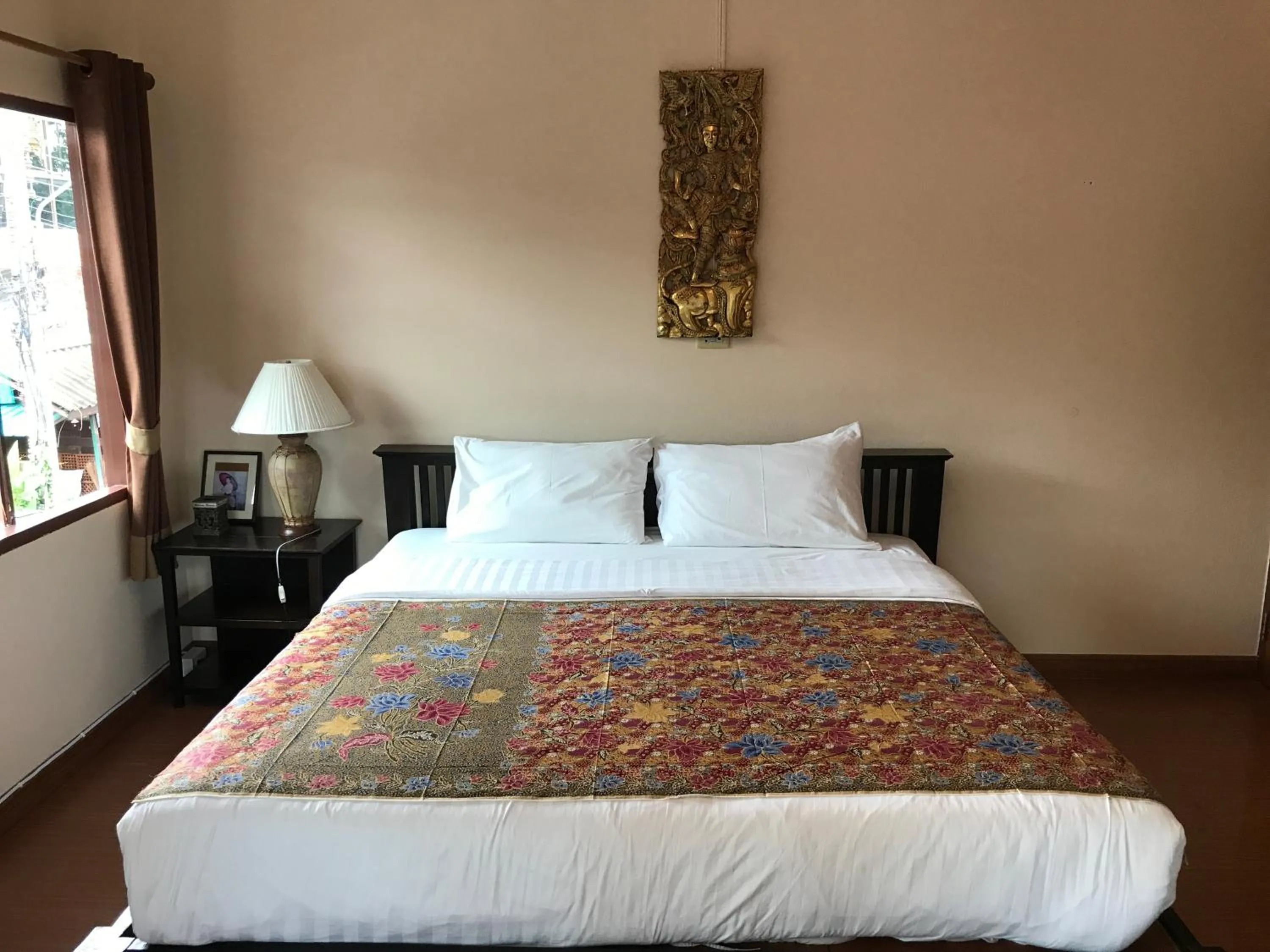 Bed in Baan Klang Vieng