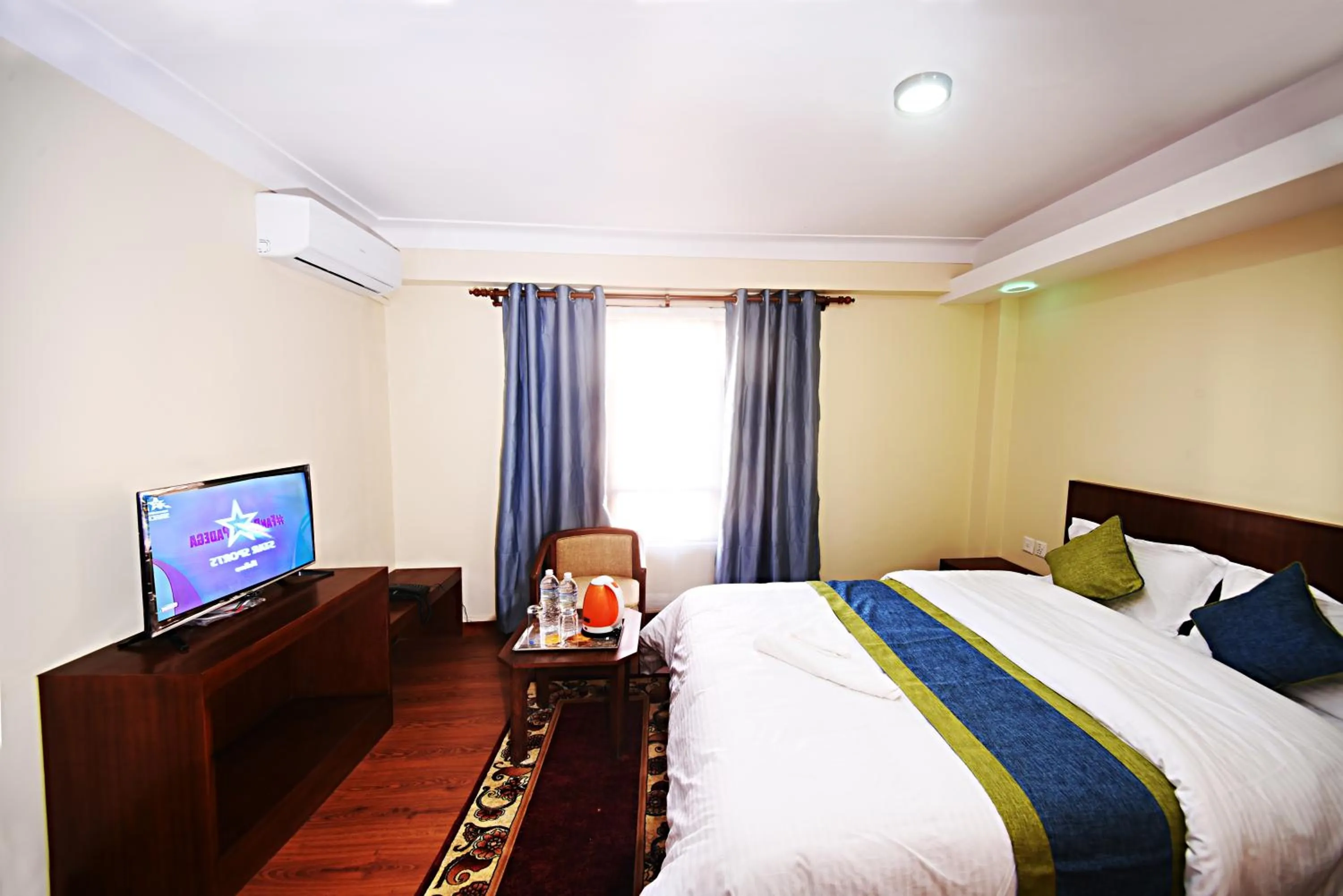 Photo of the whole room, Bed in Karma Hotel Nepal