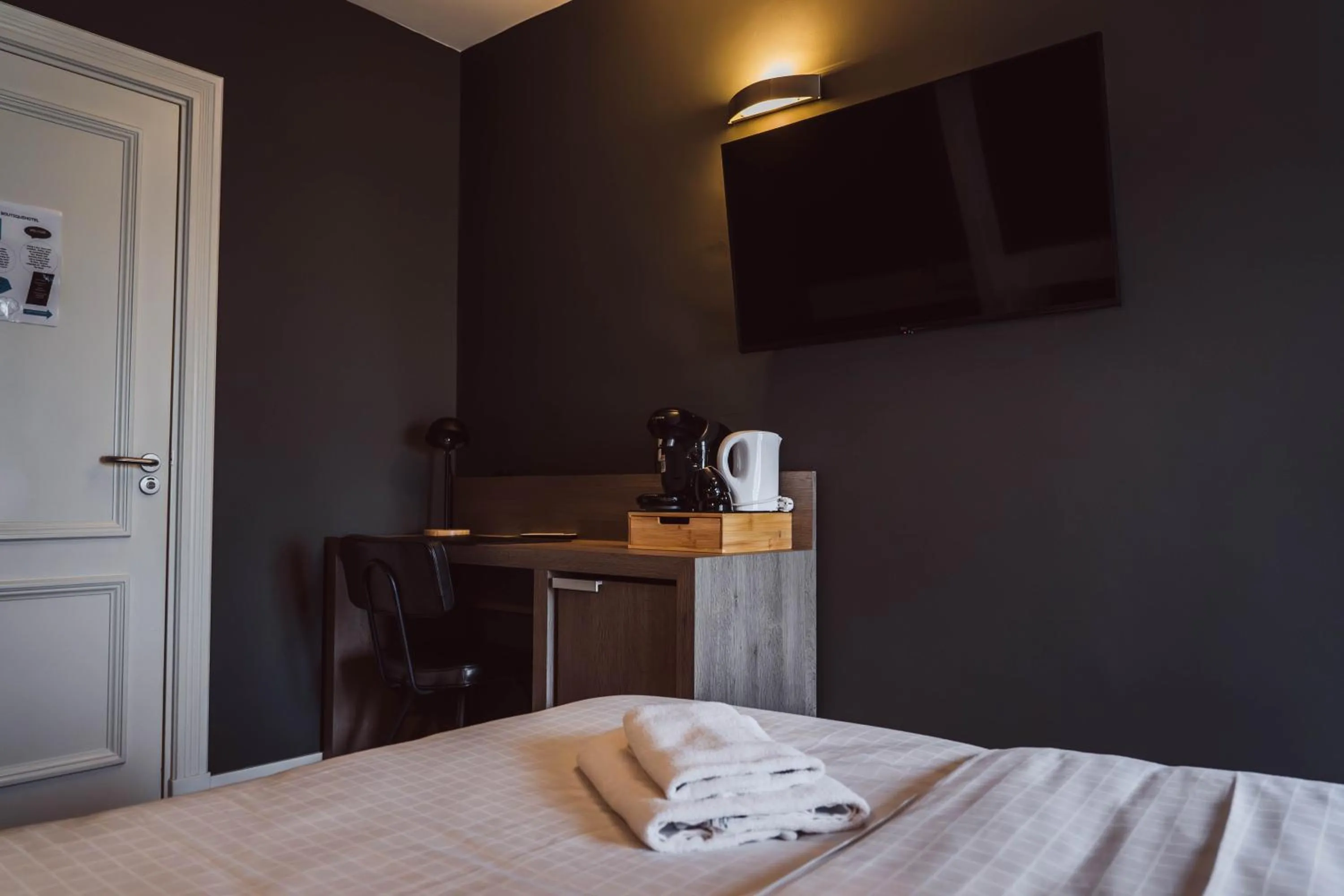 Bed in Tres Boutique Hotel