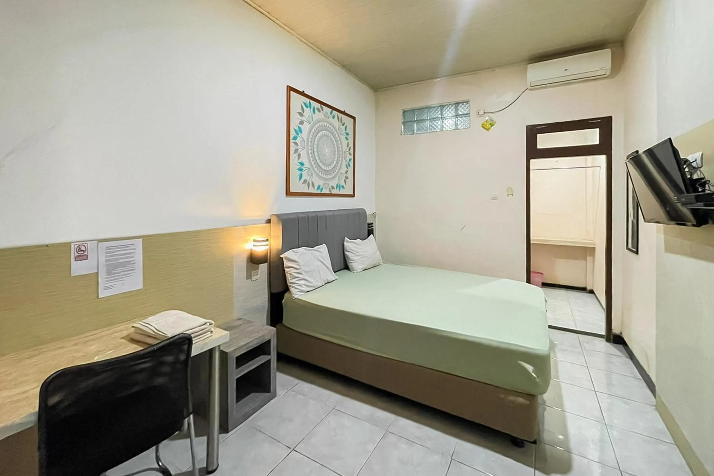 Bedroom, Bed in Urbanview Hotel Delima 101 Syariah