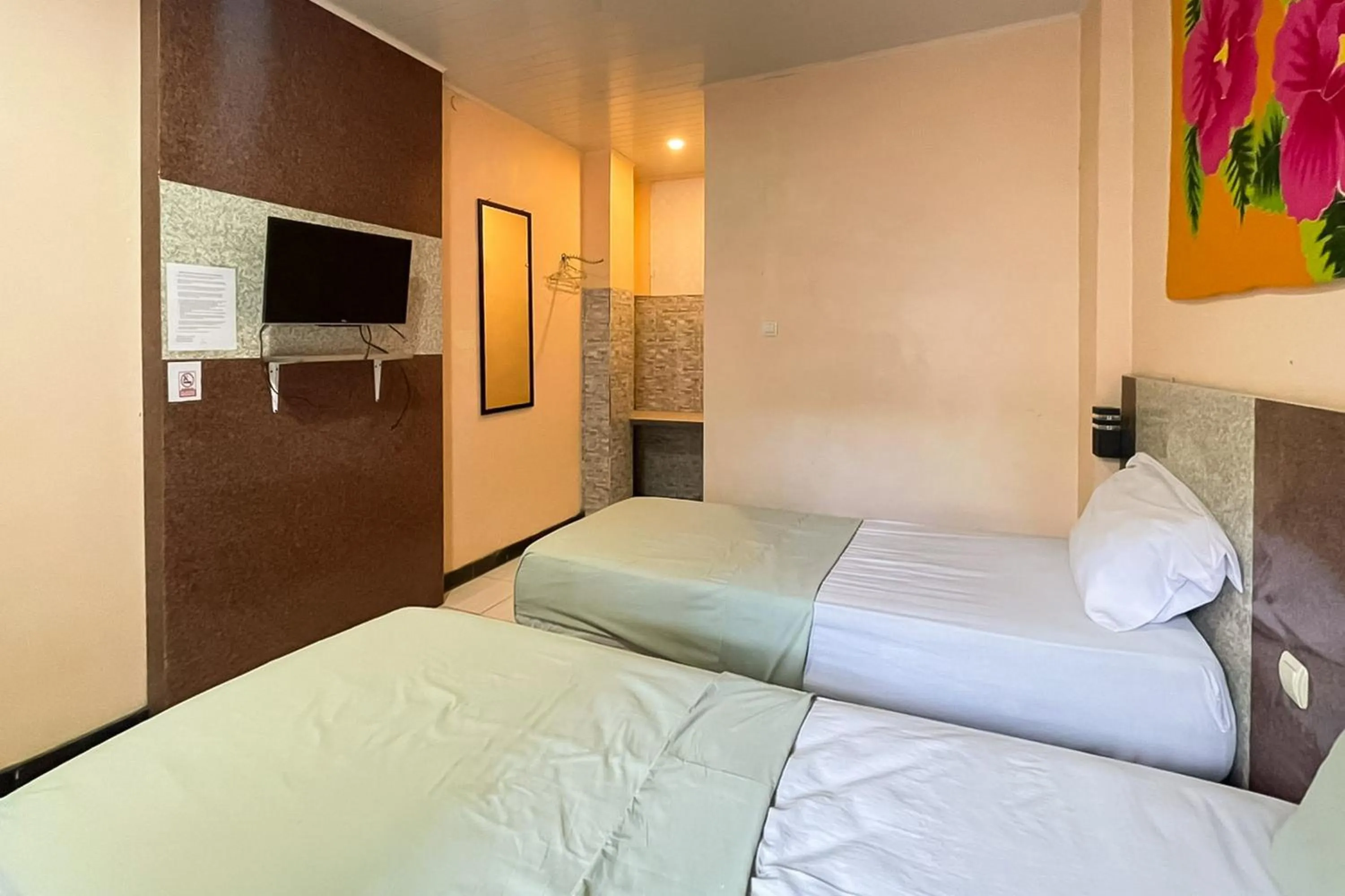 Bedroom, Bed in Urbanview Hotel Delima 101 Syariah