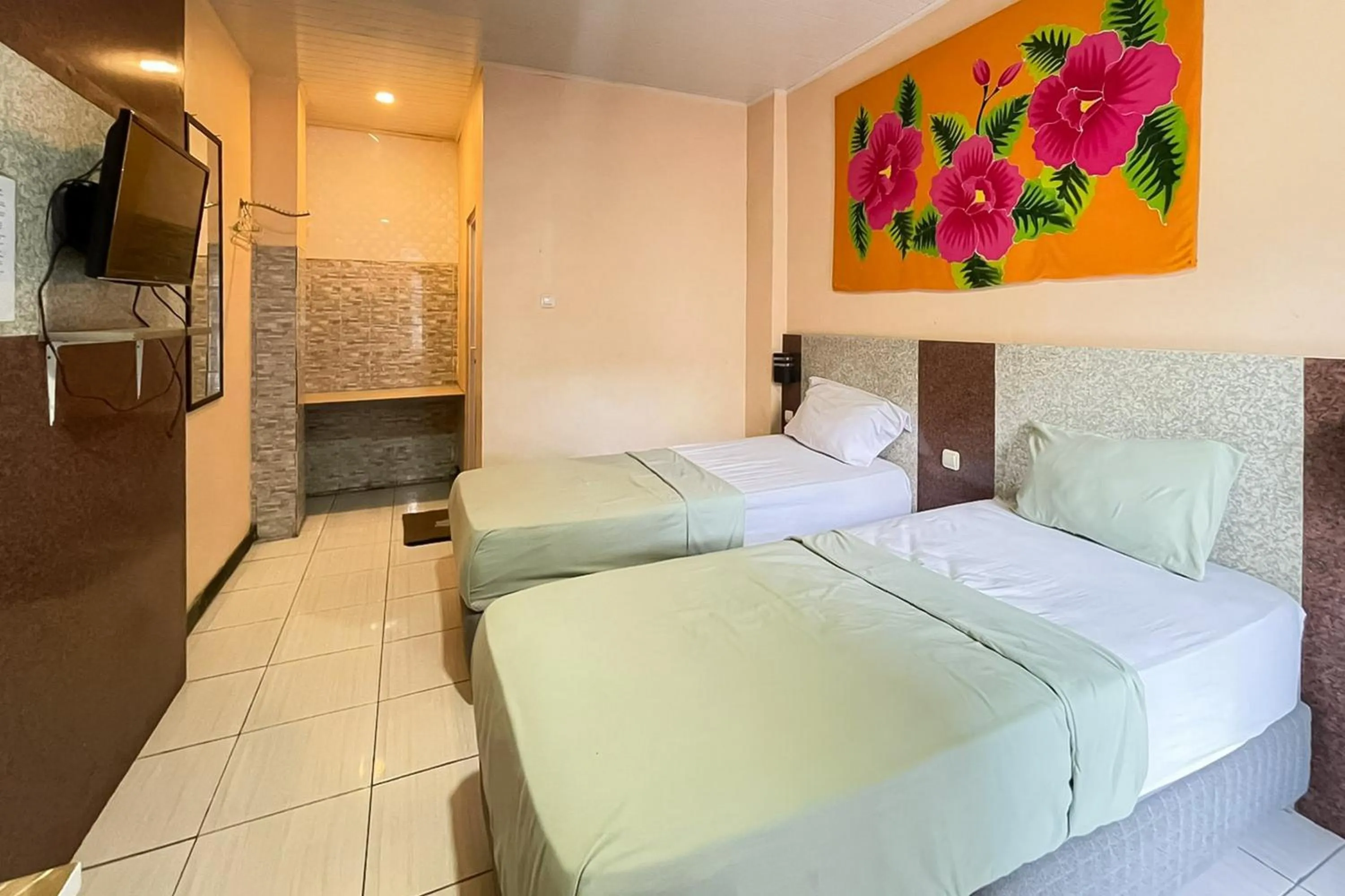 Bedroom, Bed in Urbanview Hotel Delima 101 Syariah