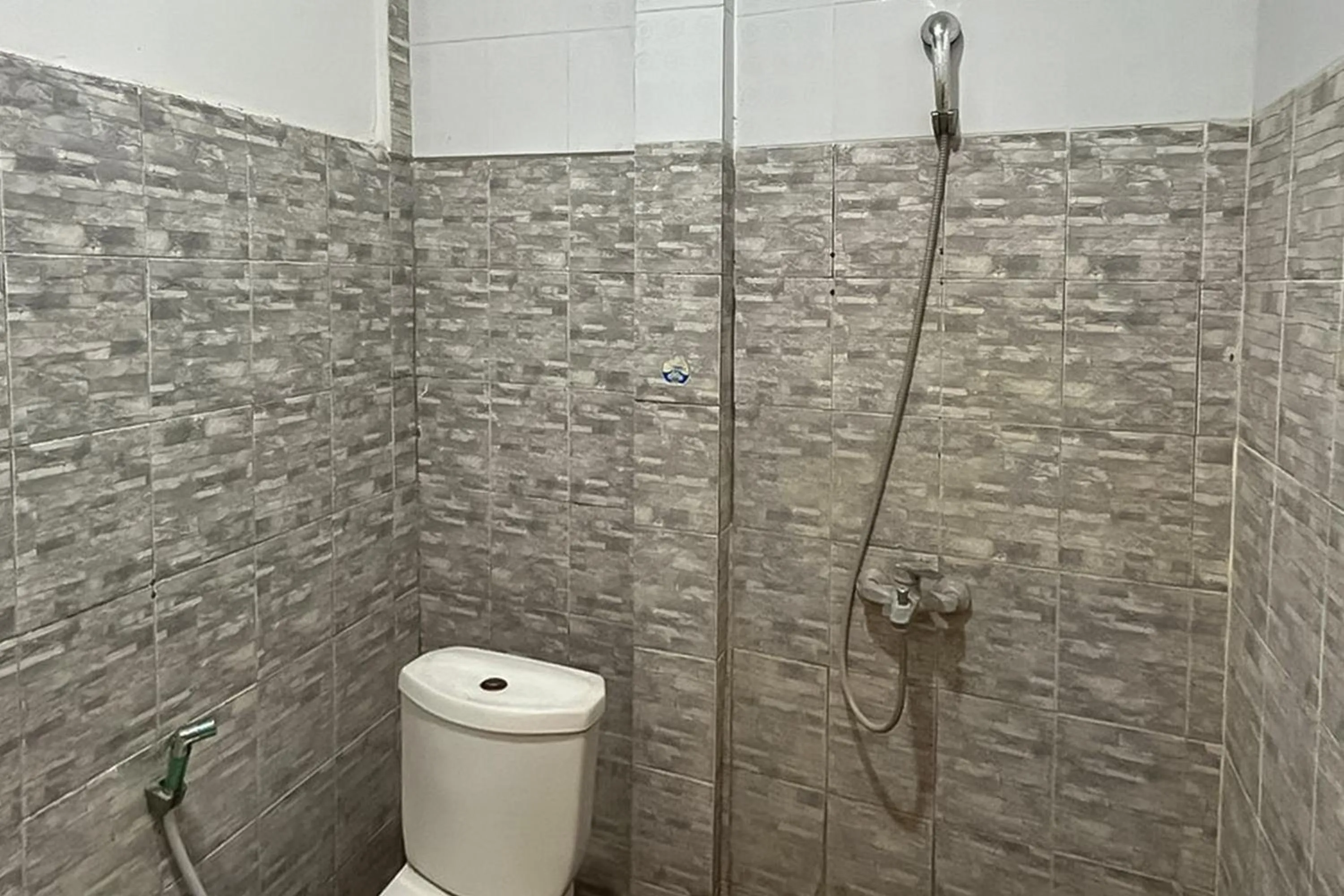 Bathroom in Urbanview Hotel Delima 101 Syariah