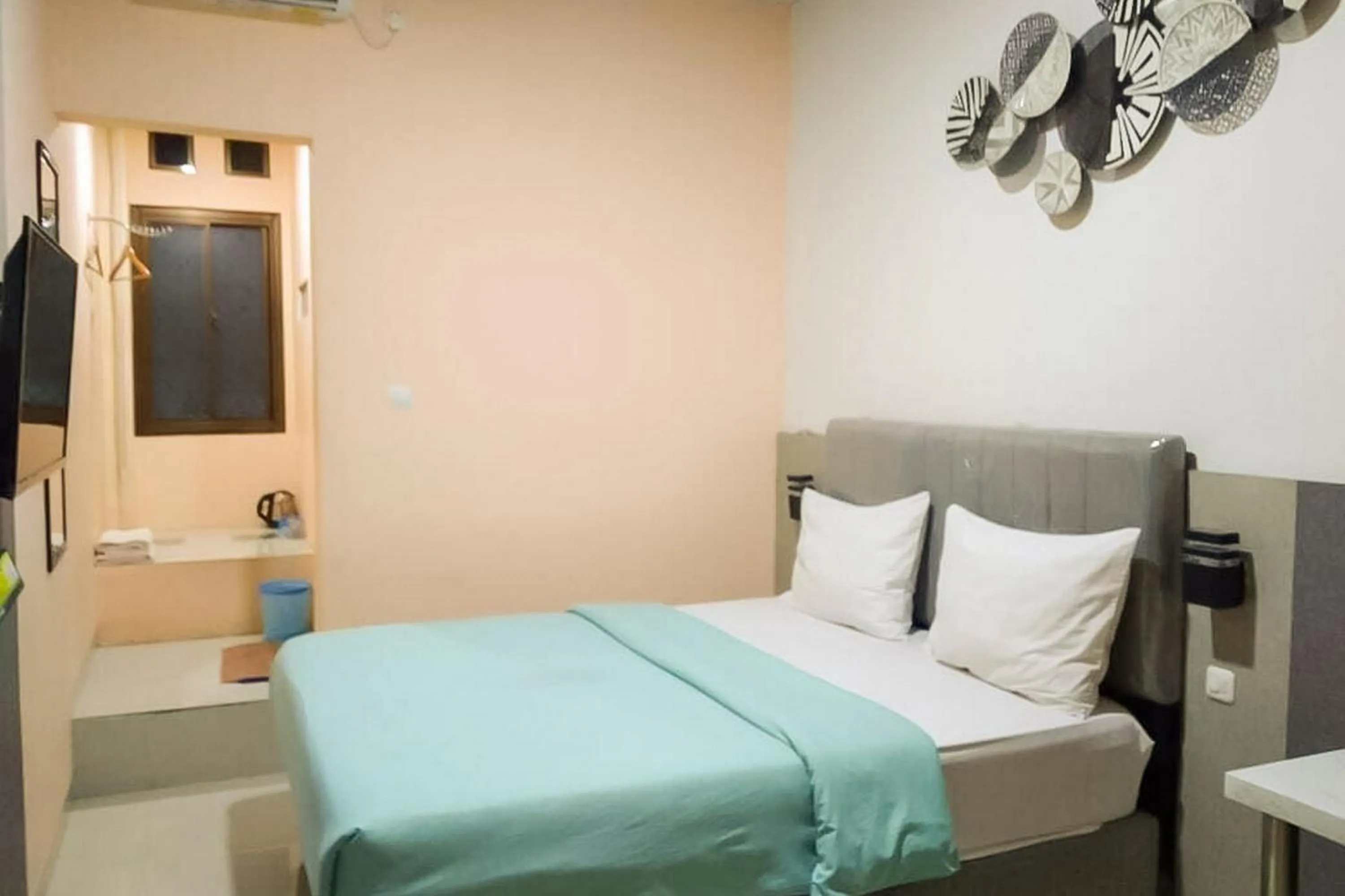 Bedroom, Bed in Urbanview Hotel Delima 101 Syariah