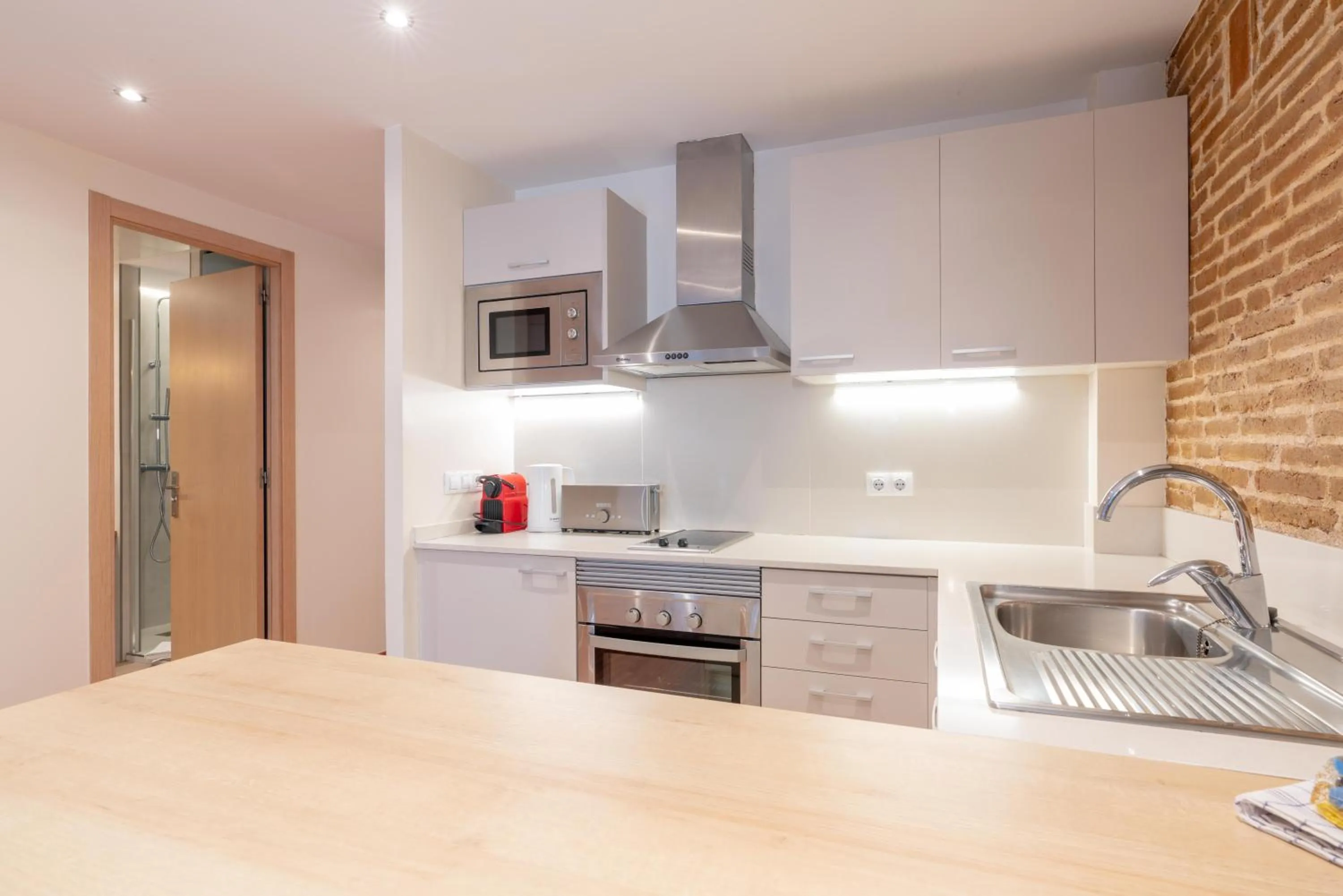 Kitchen or kitchenette in Serennia Cest Apartamentos Arc de Triomf