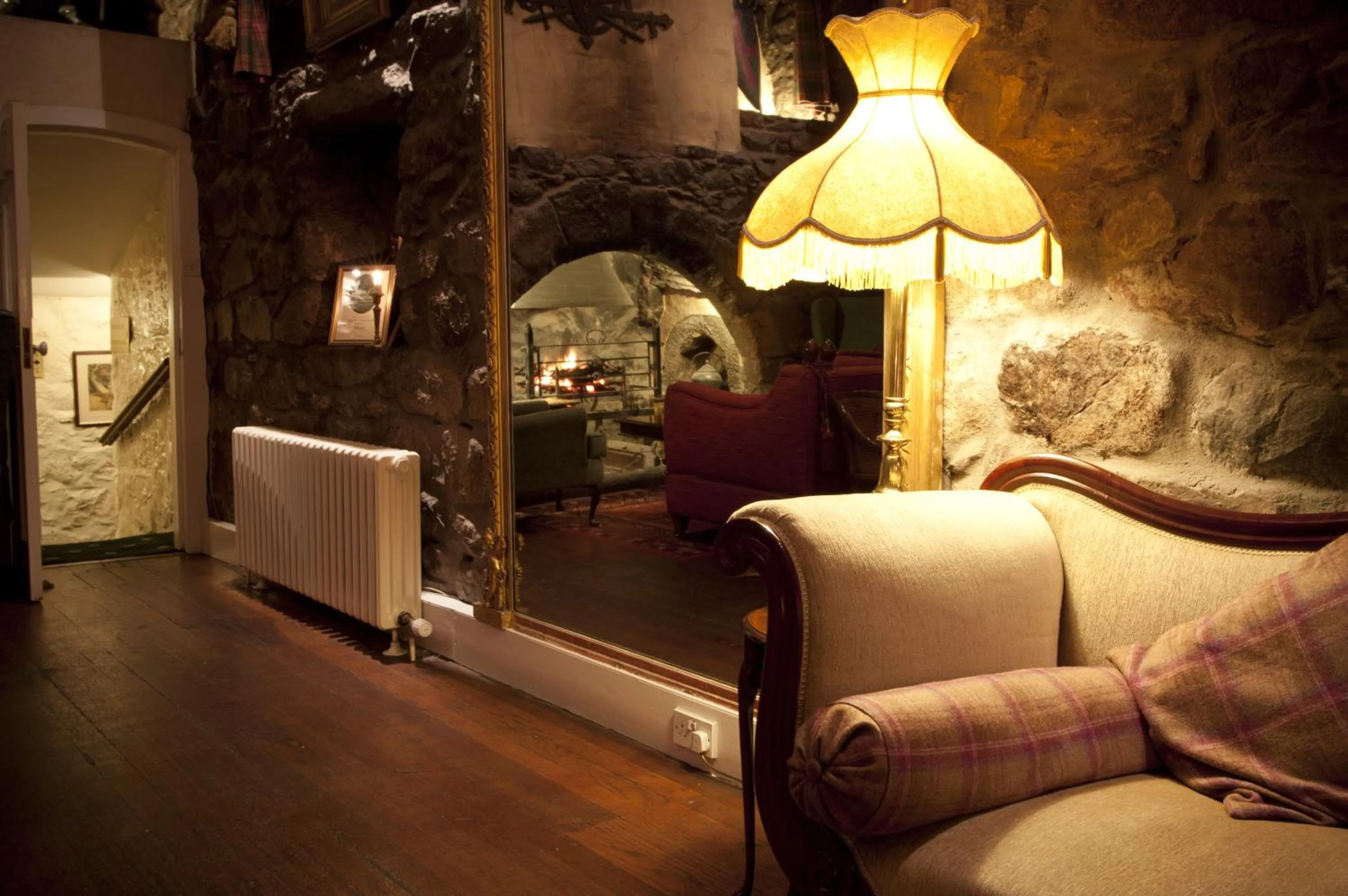 Communal lounge/ TV room in Maryculter House