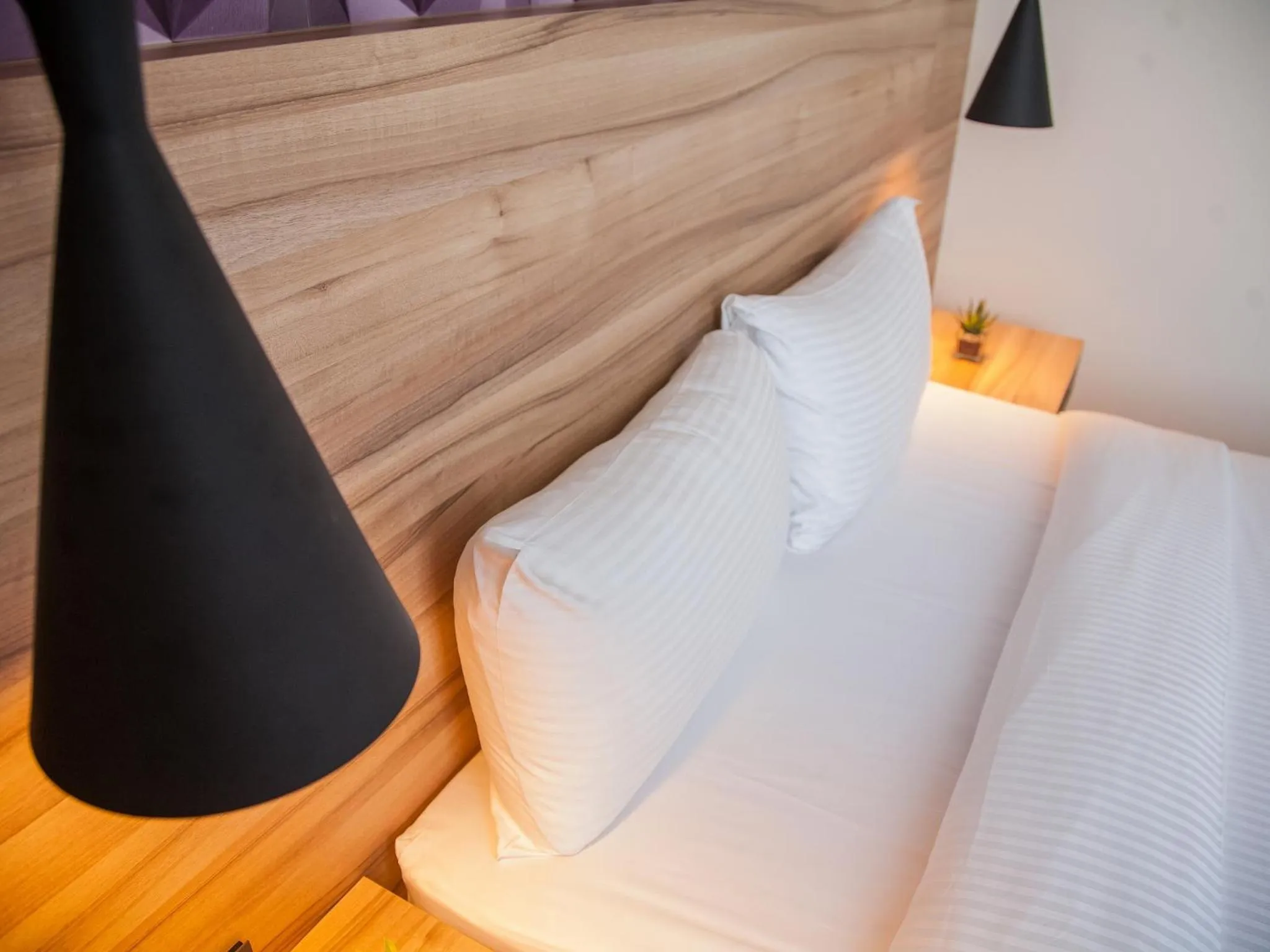 Bed in Rainbow Hotel