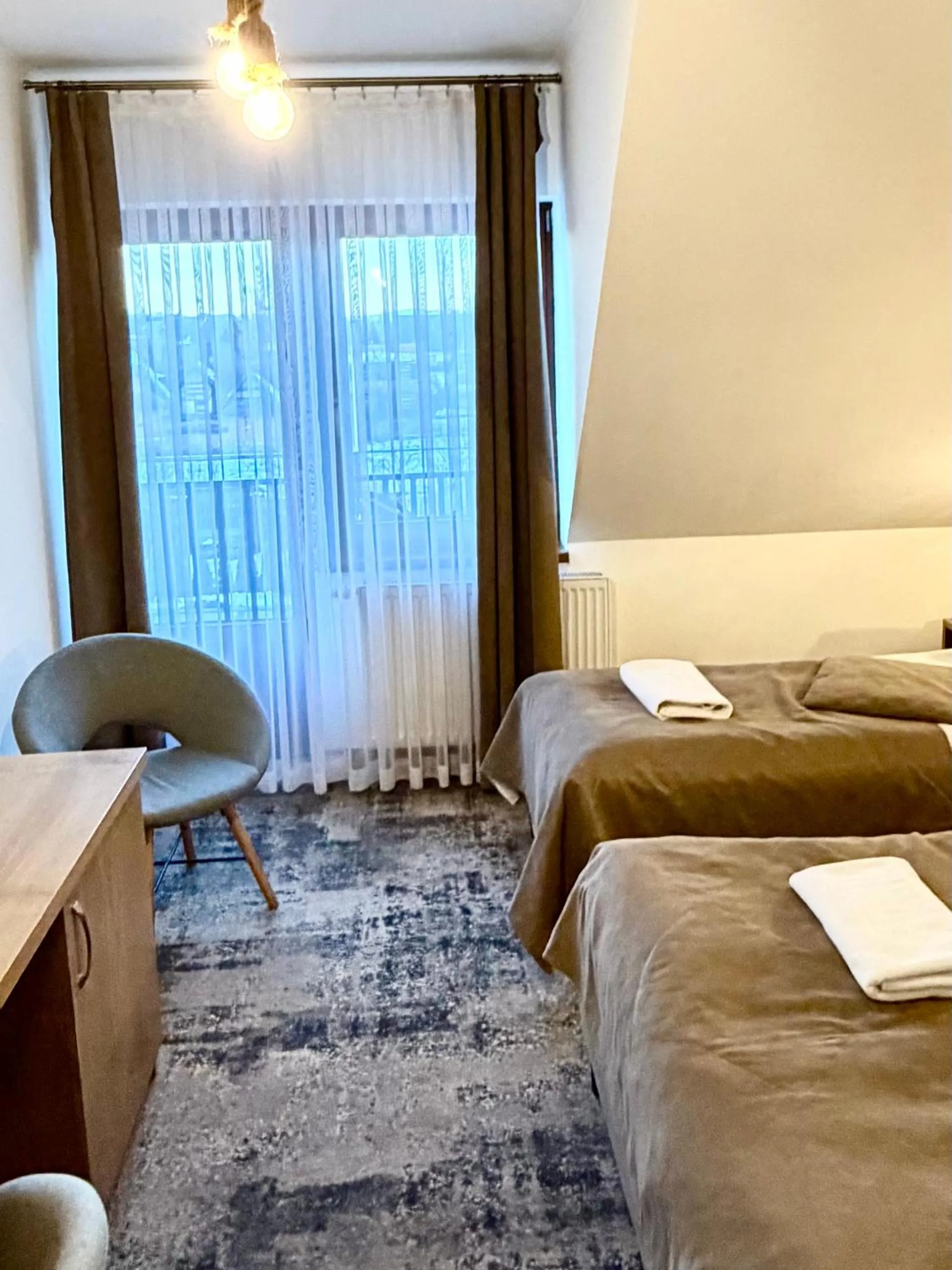 Bed in ZAJAZD BIAŁCZAŃSKI Dom Wypoczynkowy Restauracja