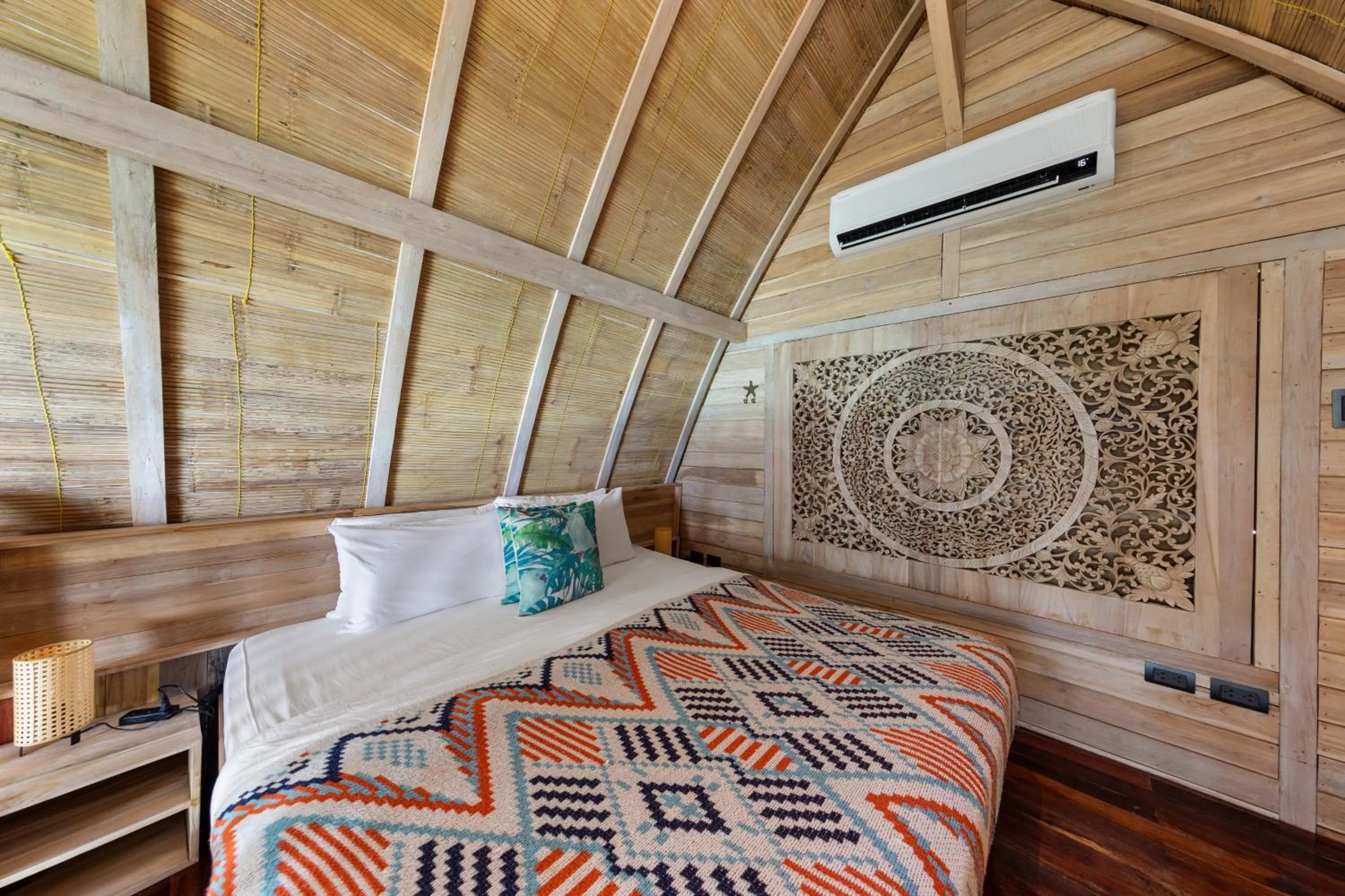 Bed in Karuna El Nido Villas