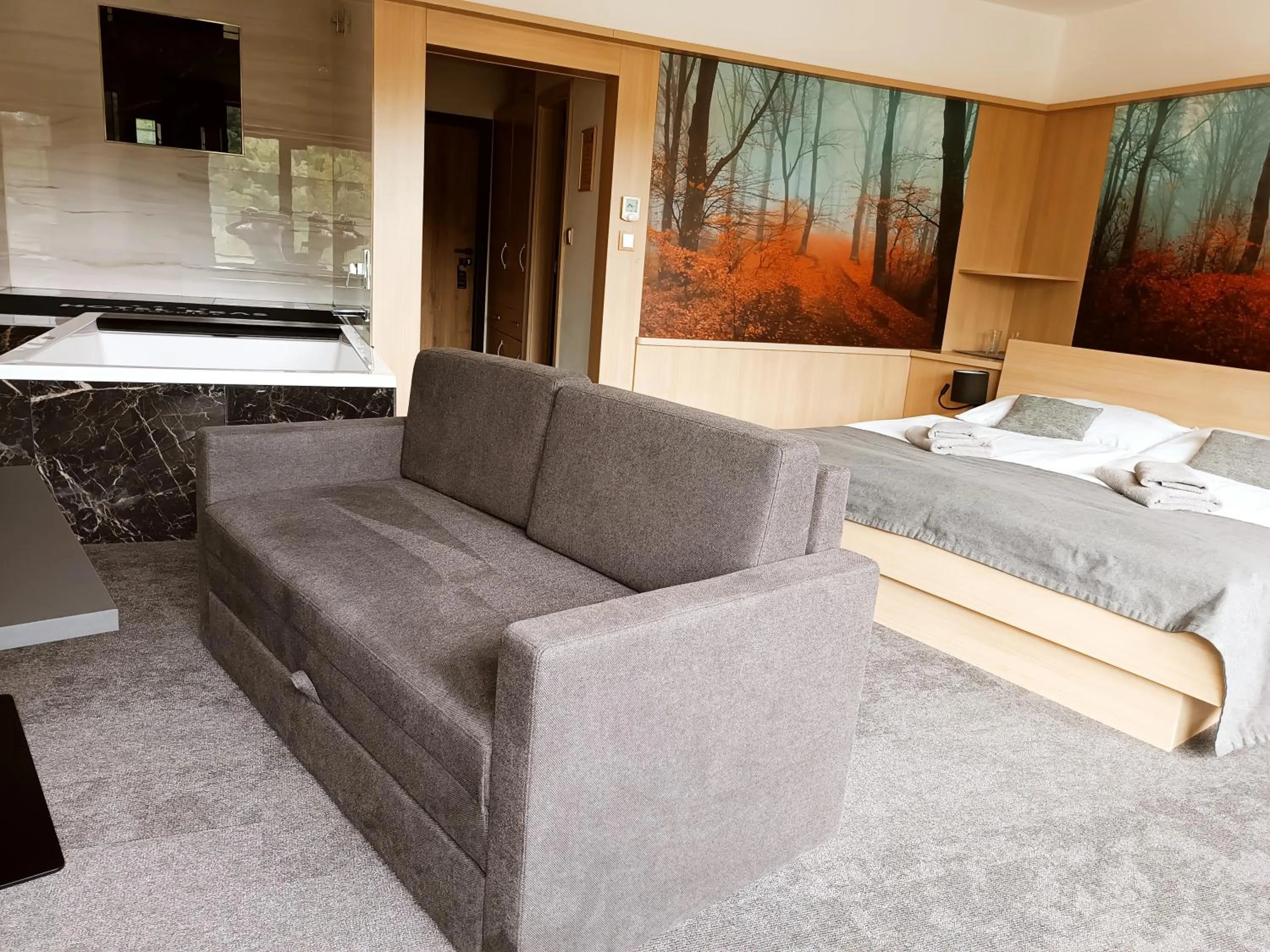 Seating area, Bed in Hotel Kras