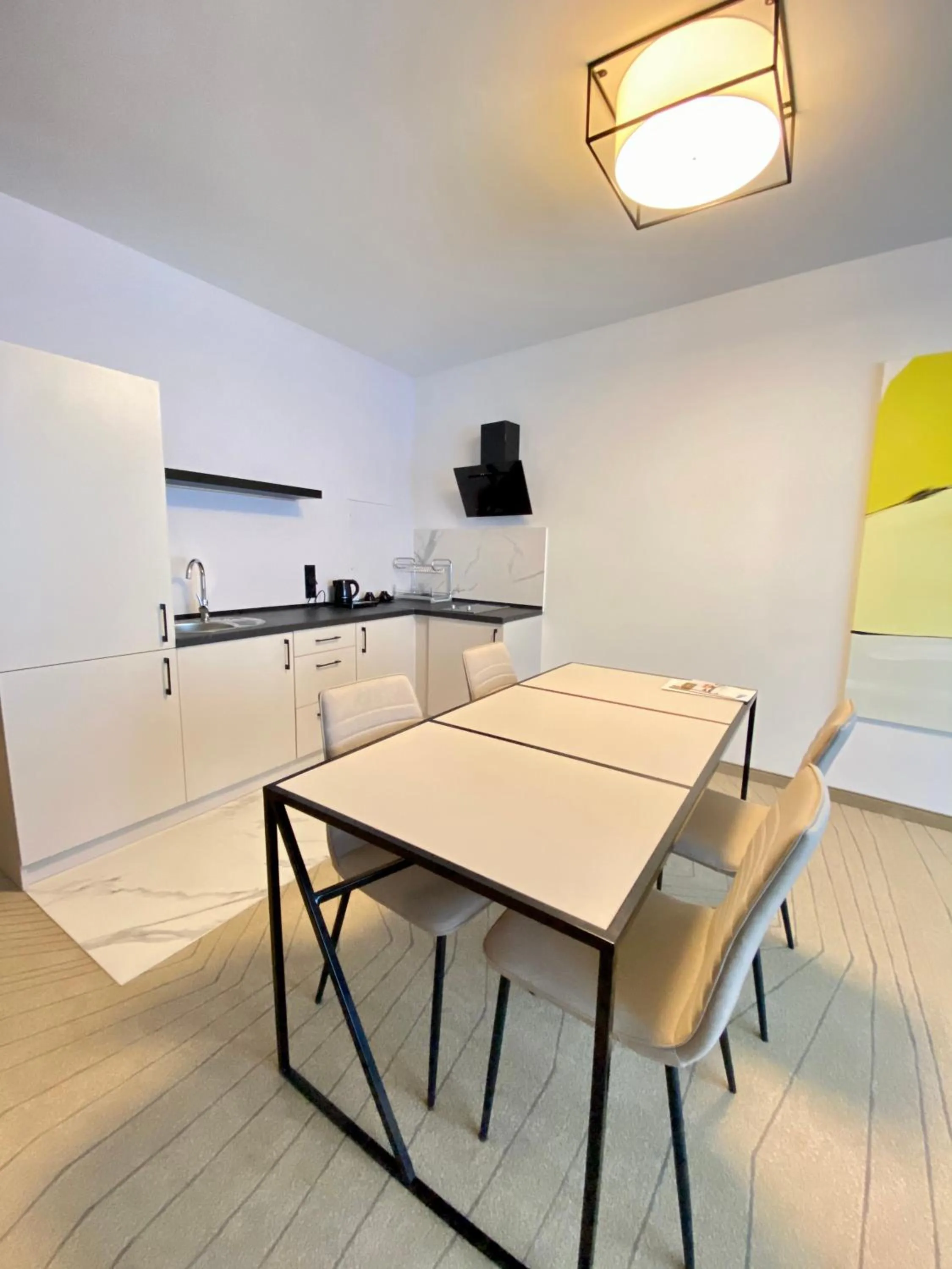 Kitchen or kitchenette in Arche Hotel Krakowska