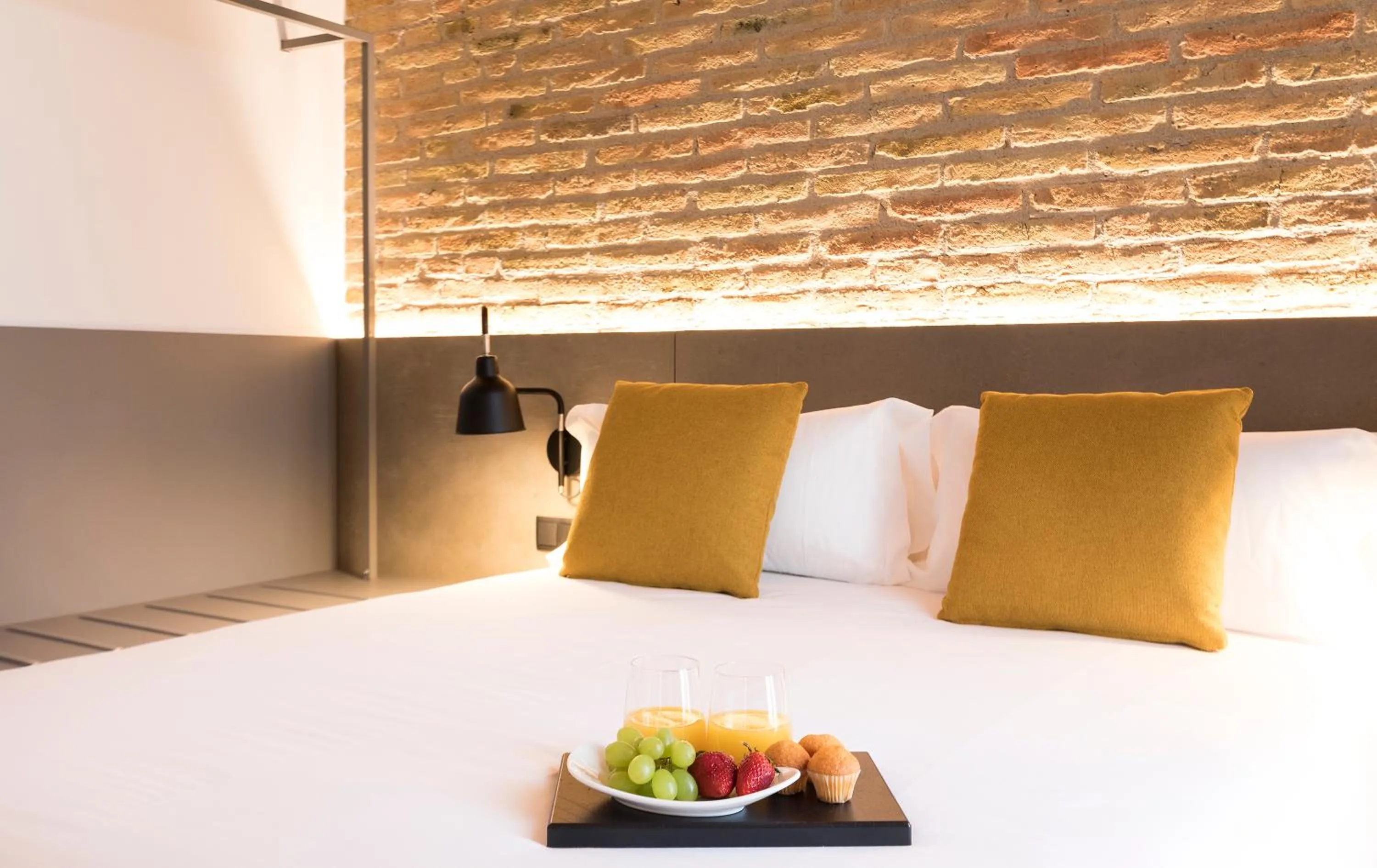 Bed in Aspasios Sagrada Familia Apartments