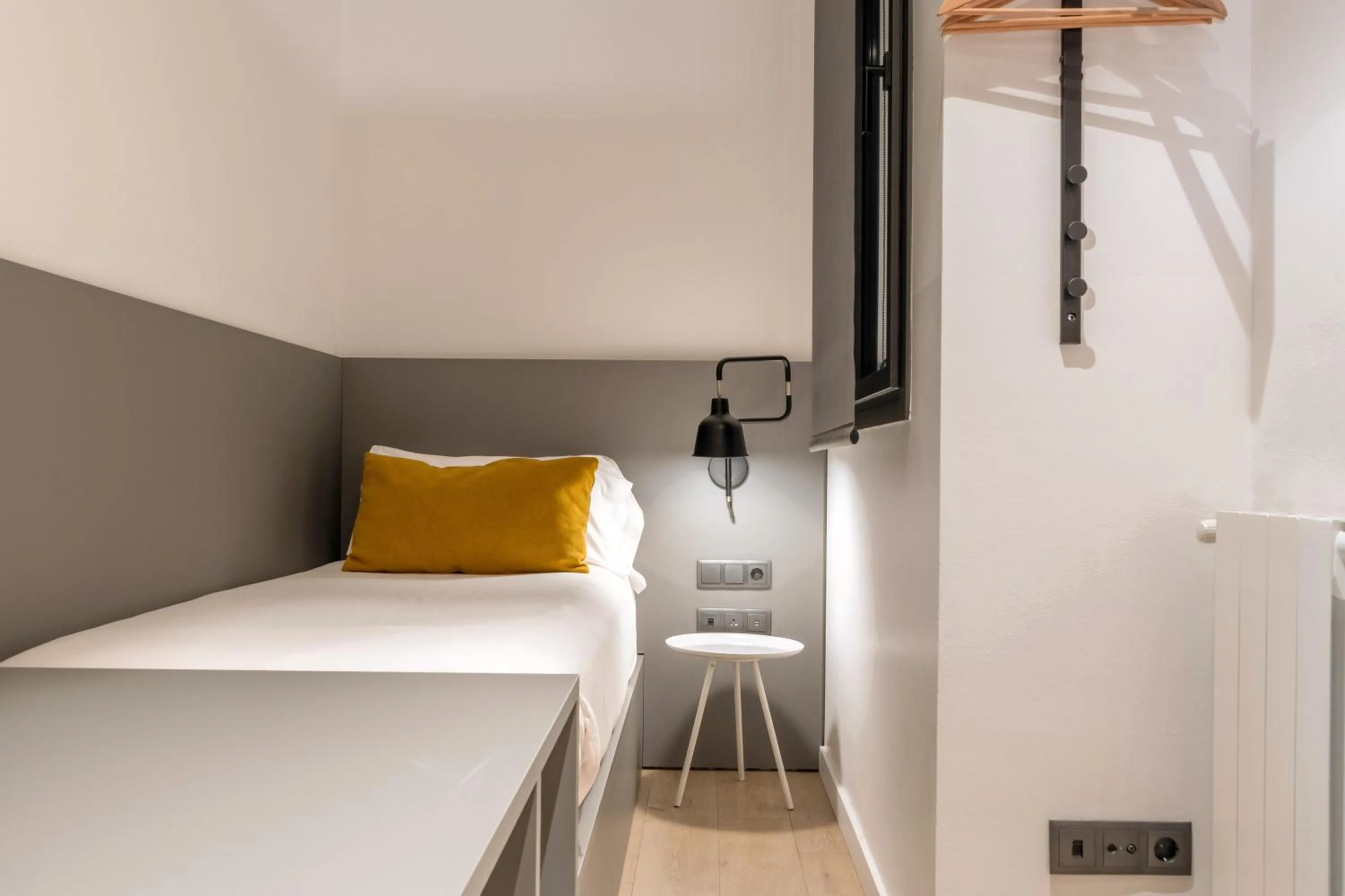 Bed in Aspasios Sagrada Familia Apartments