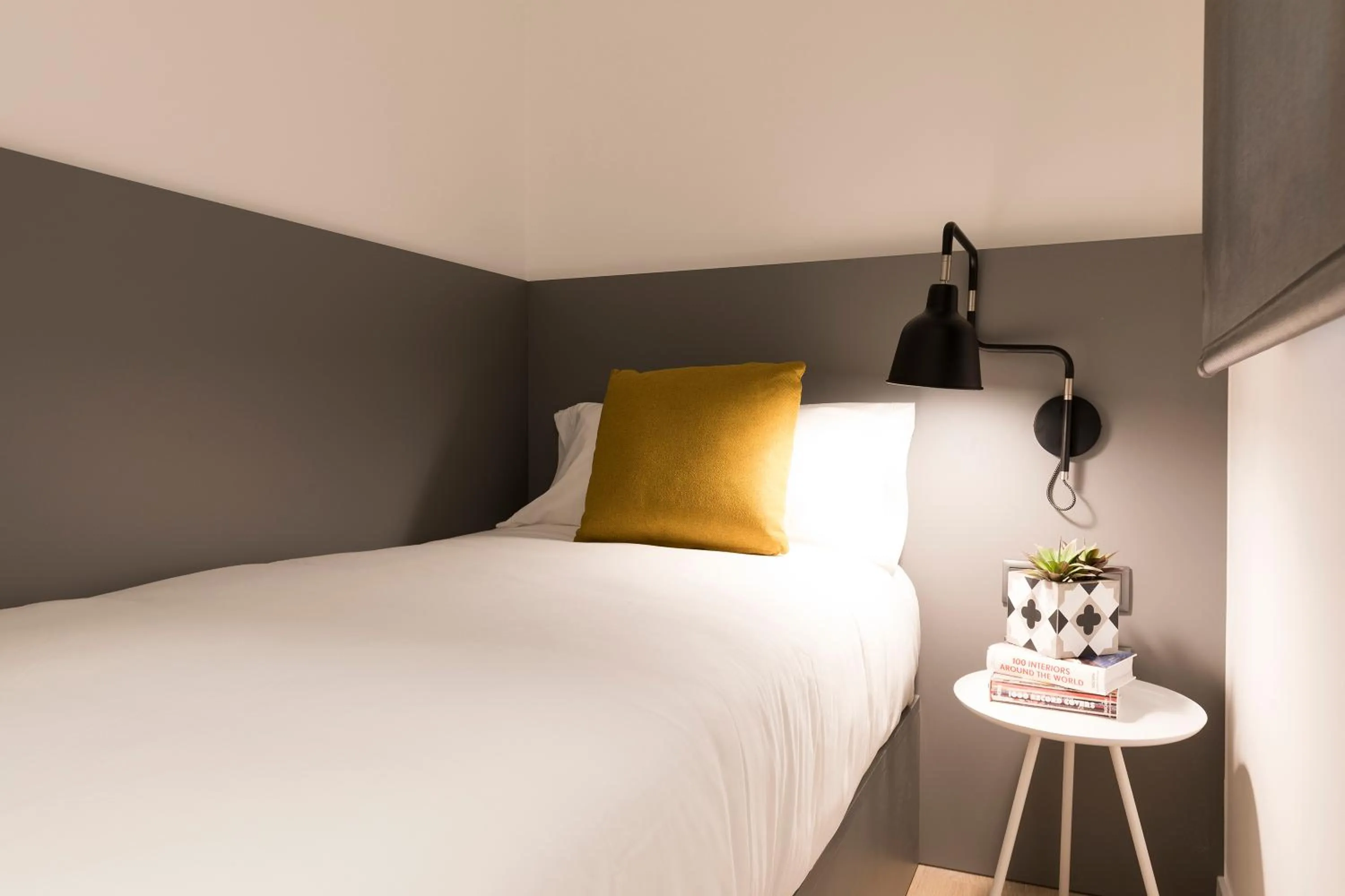 Bed in Aspasios Sagrada Familia Apartments