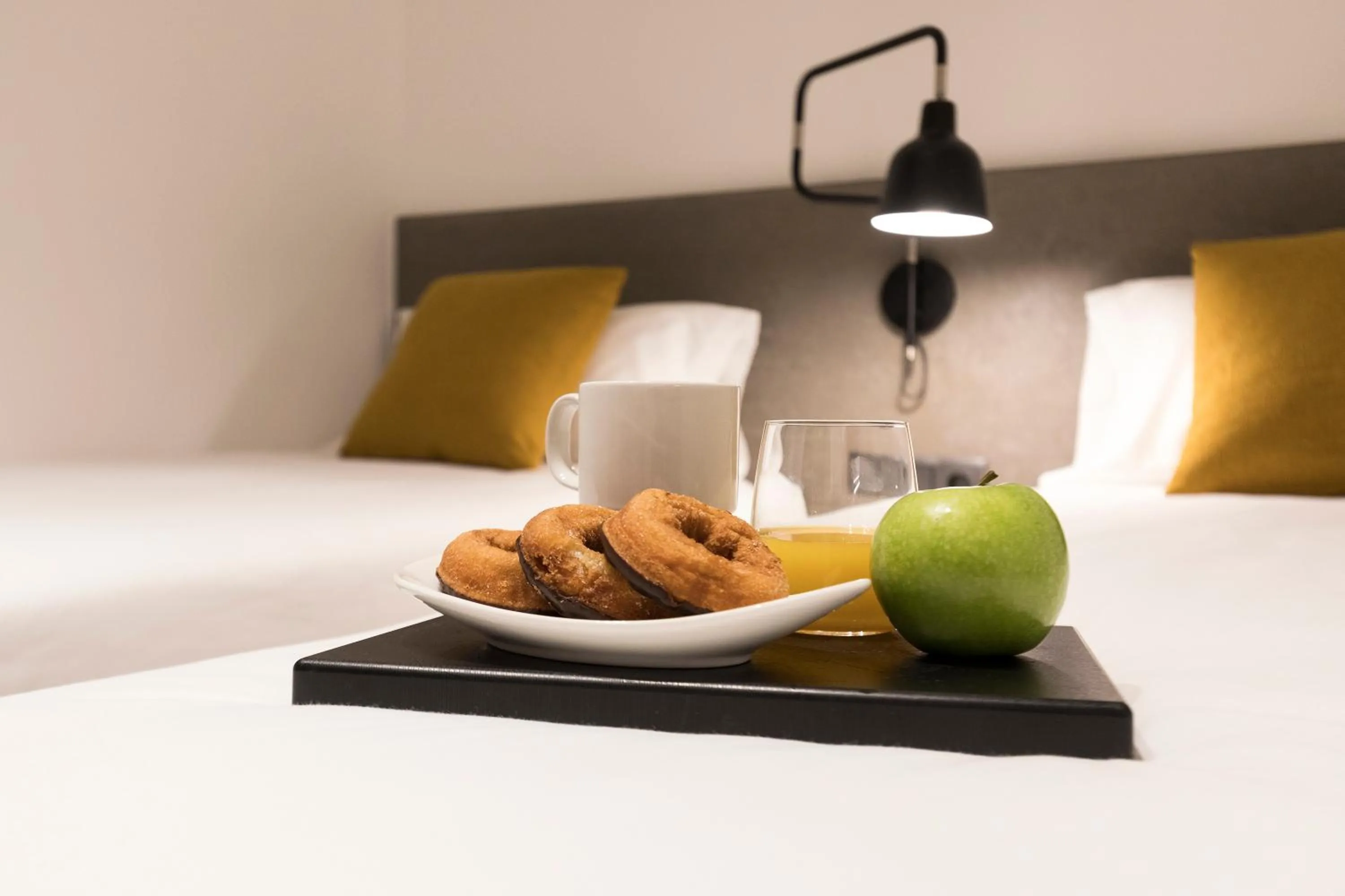 Bed in Aspasios Sagrada Familia Apartments