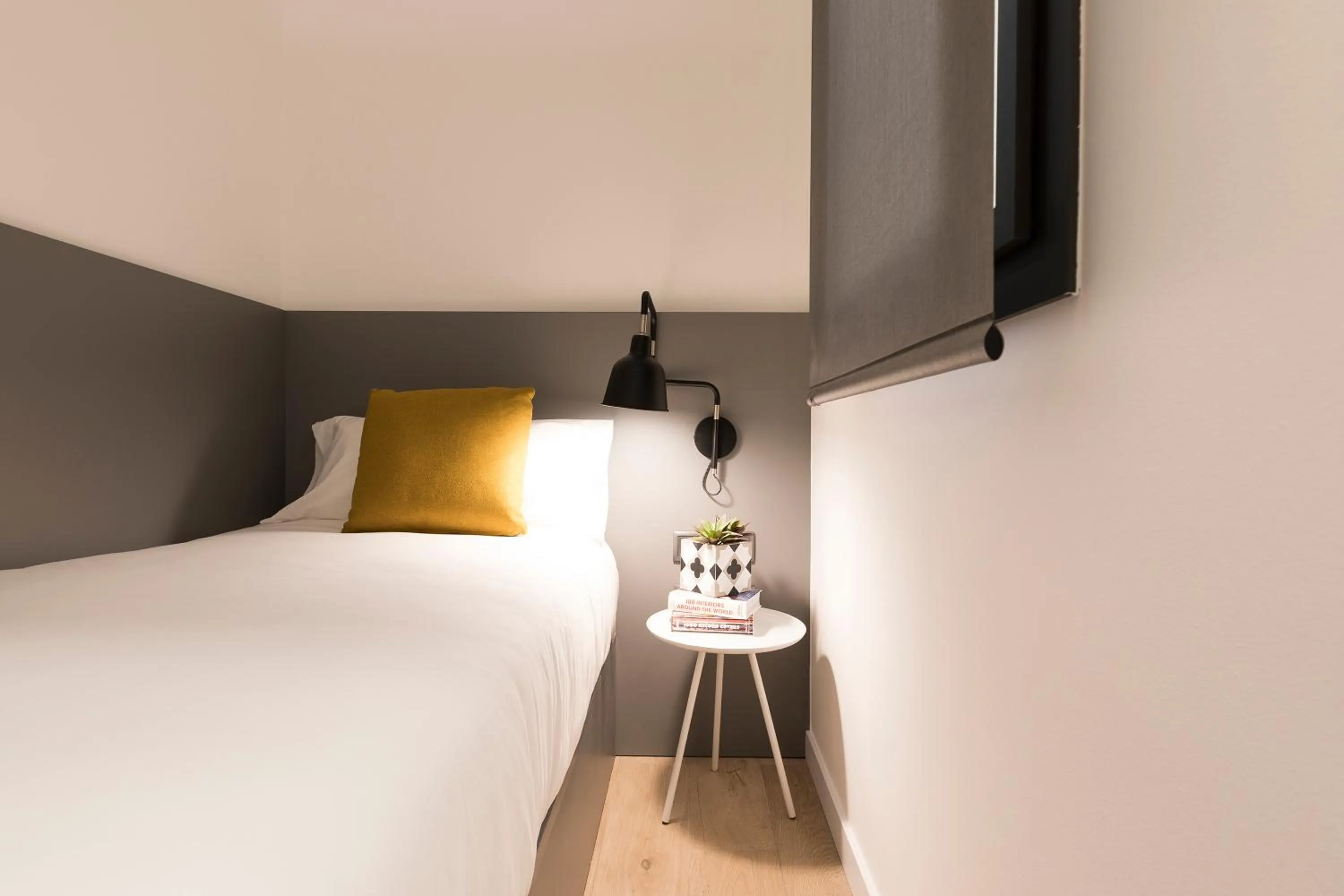 Bed in Aspasios Sagrada Familia Apartments