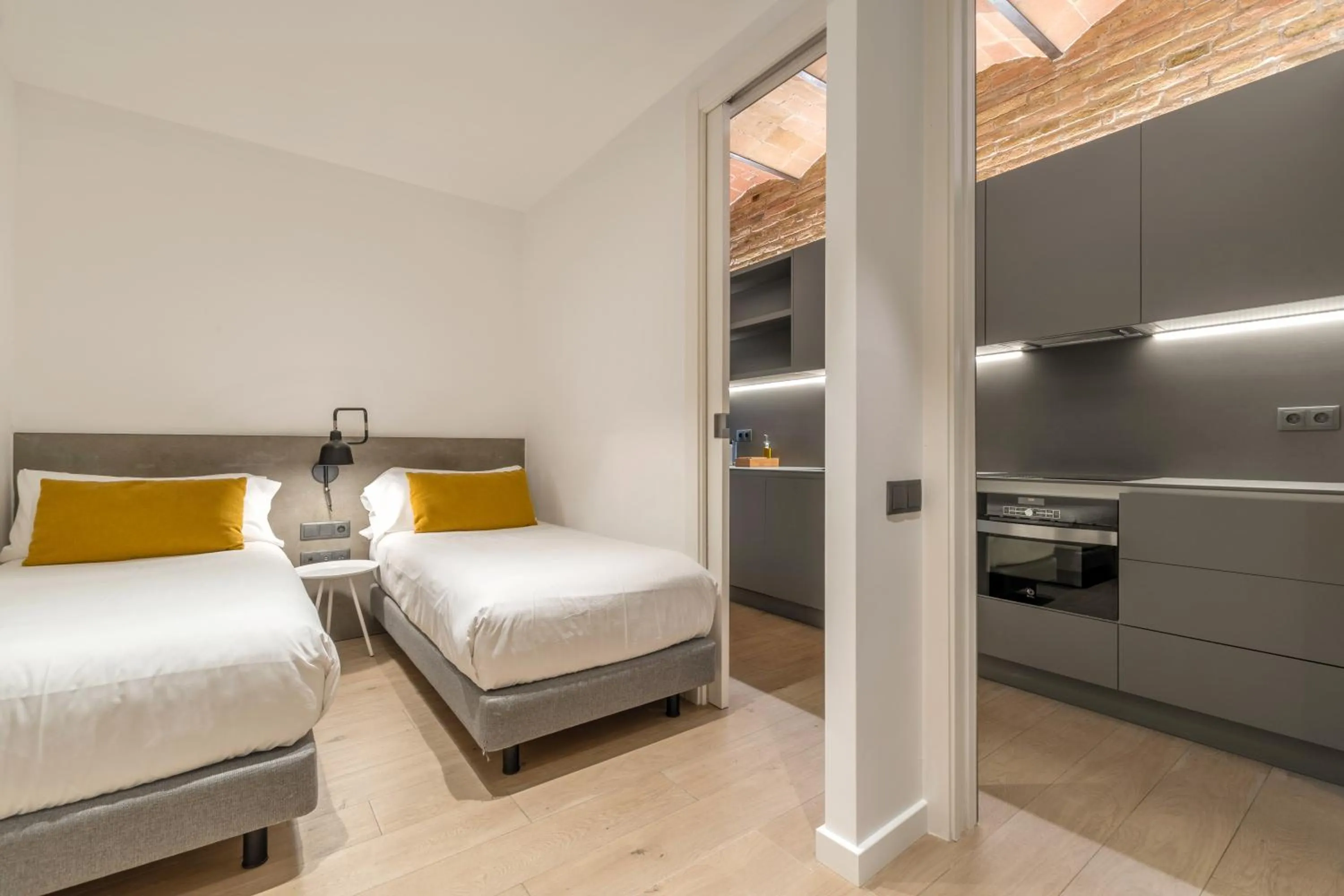 Bed in Aspasios Sagrada Familia Apartments