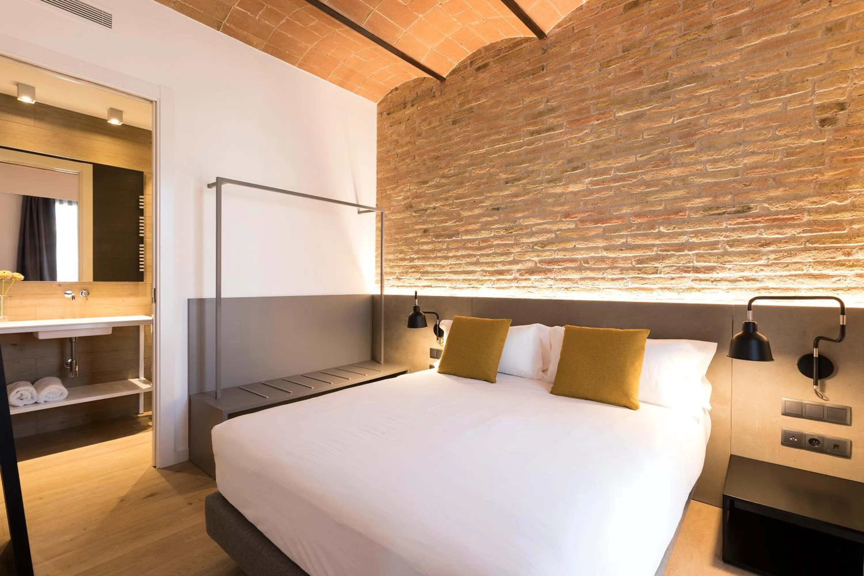 Bed in Aspasios Sagrada Familia Apartments