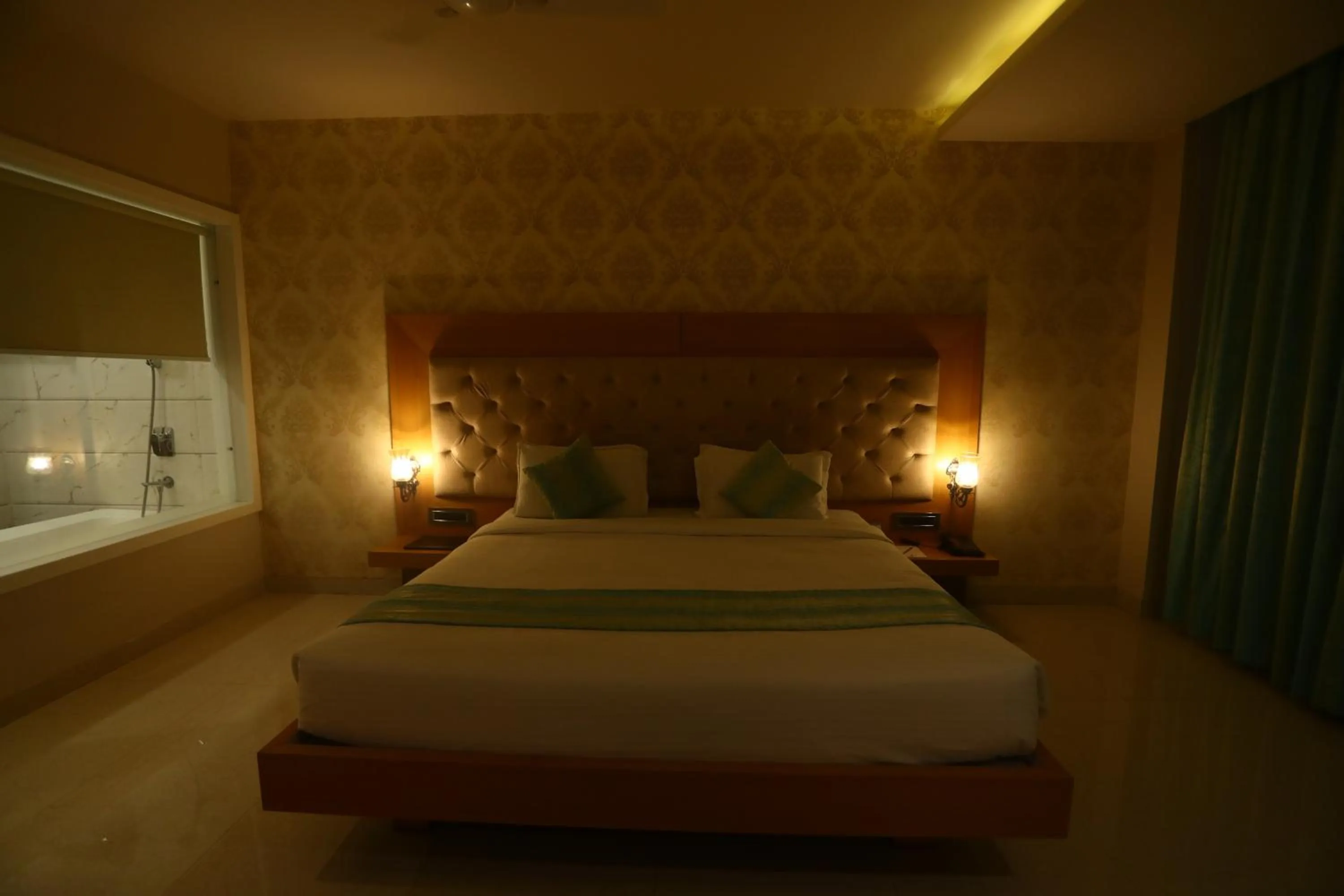 Bed in Hotel Kanha’s Palm Springs